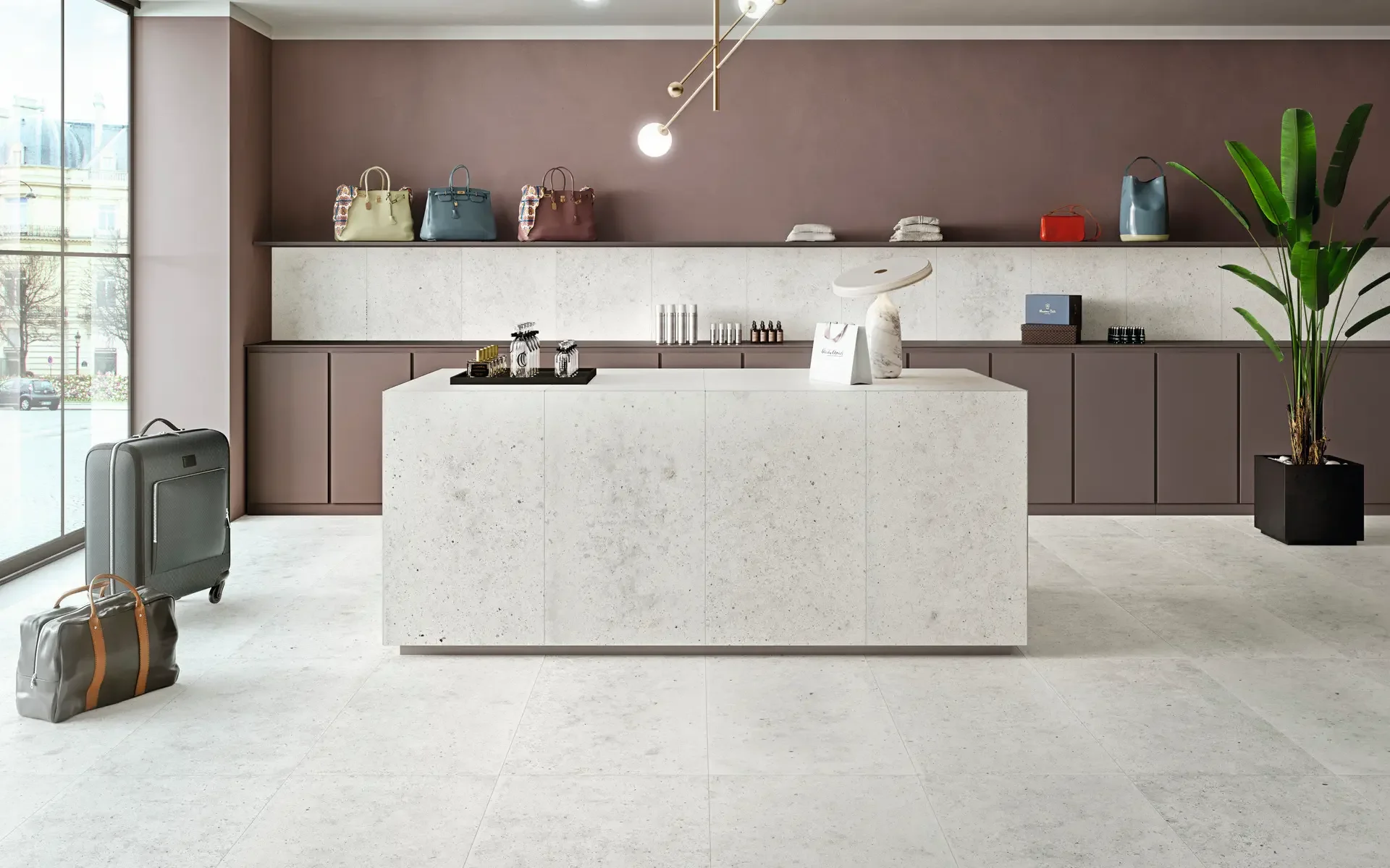 Luxury retail space featuring high-end stone-effect porcelain surfaces from the Iris Ceramica Group, highlighting a clean, minimalist aesthetic, available through PietraCasa.