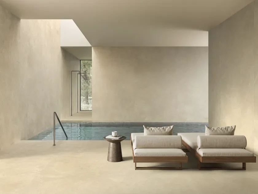 Serene interior space featuring the Calcis collection by Italgraniti Group, highlighting their large porcelain slabs produced under the Italstone architectural brand, available through PietraCasa.