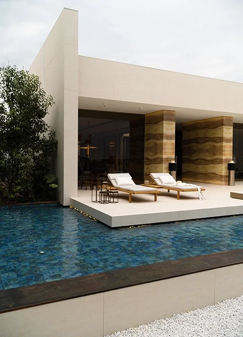 Minimalist luxury villa deck and pool area finished with Inalco large-format MDi (Minerals, Design, Innovation) architectural surfaces, exclusively distributed in the UK by PietraCasa.
