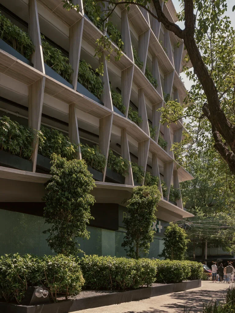 The Castelar 75 building in Polanco, Mexico City, showcasing a biomimetic architectural framework with a ventilated green facade and high-performance Laminam ceramic slab cladding.