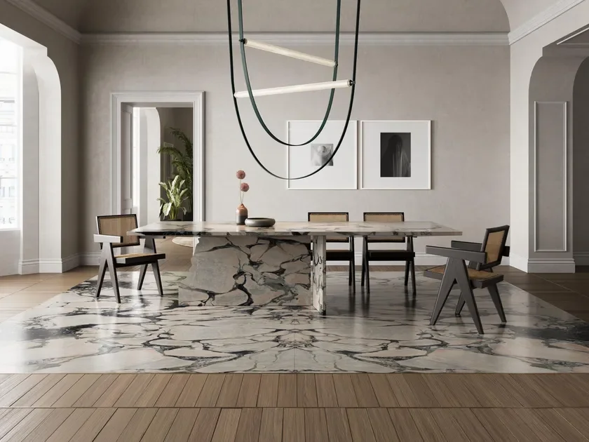 Elegant dining room featuring Notre Dame marble by the Italian natural stone brand Margraf, supplied by PietraCasa.