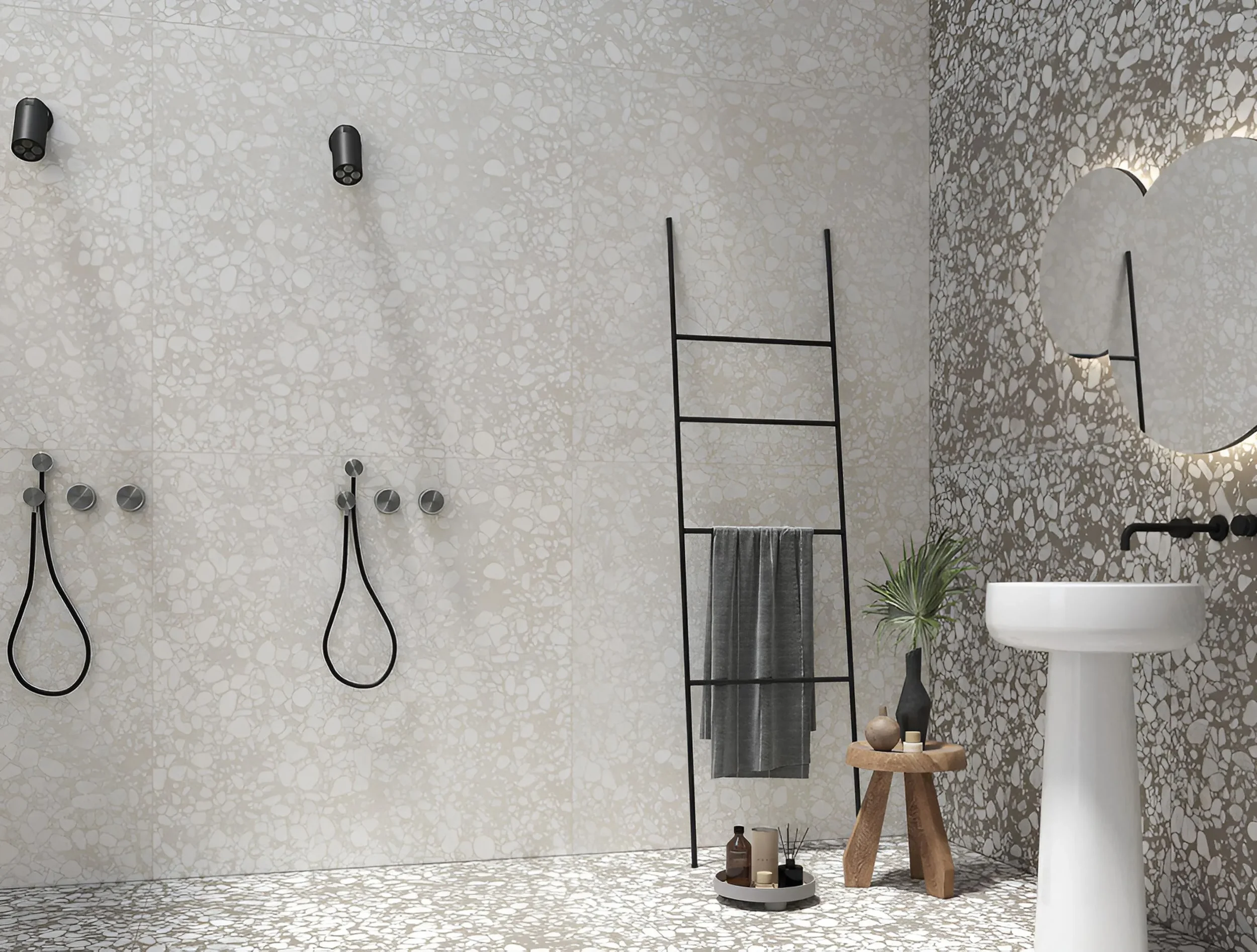 Bathroom space featuring the Cluster collection by the Micro brand (Terratinta Group), showcasing large-format porcelain stoneware tiles inspired by Venetian Palladiana and terrazzo, supplied by PietraCasa.