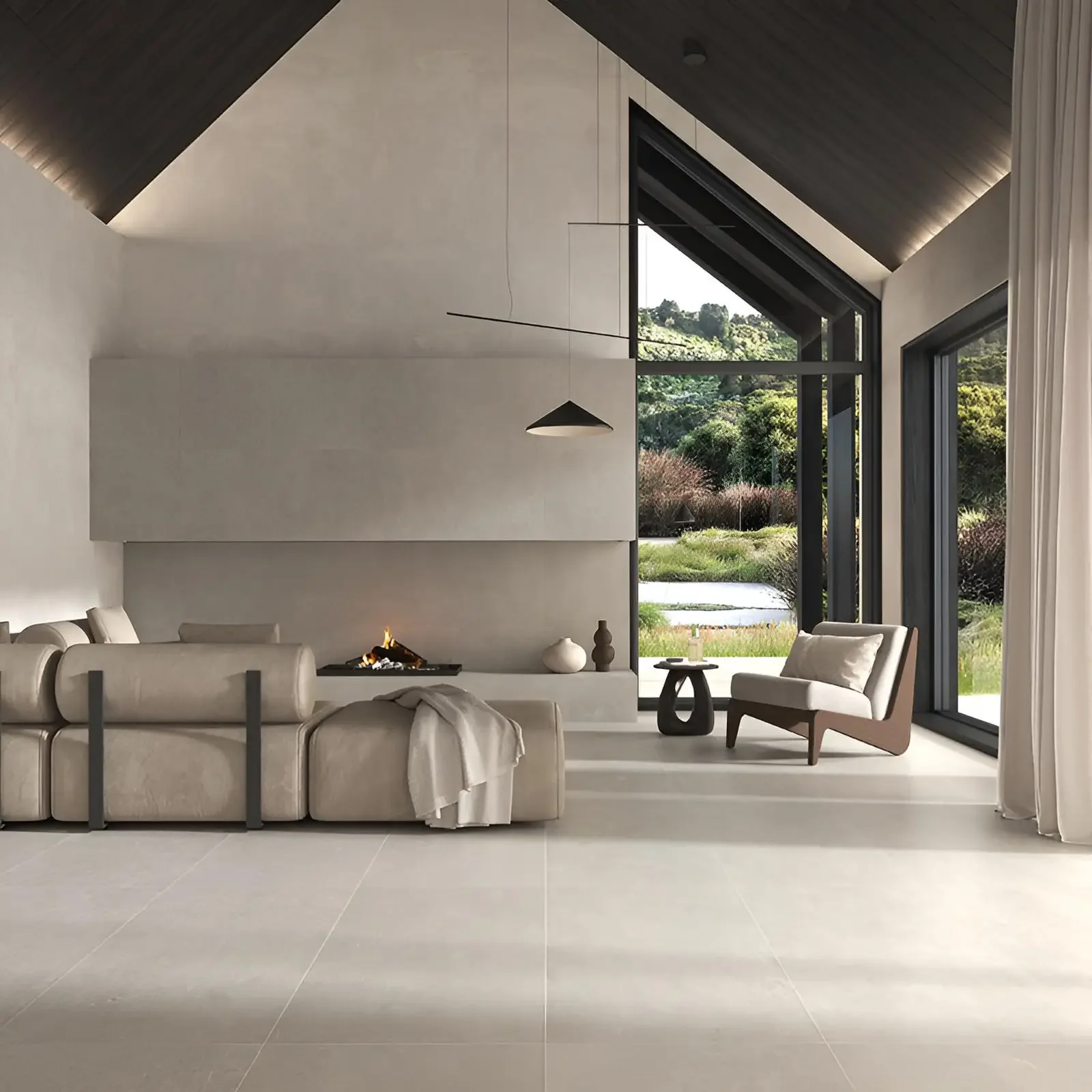 Modern, minimalist living room featuring the Less Taupe porcelain tile by Terratinta Ceramiche, supplied by PietraCasa.