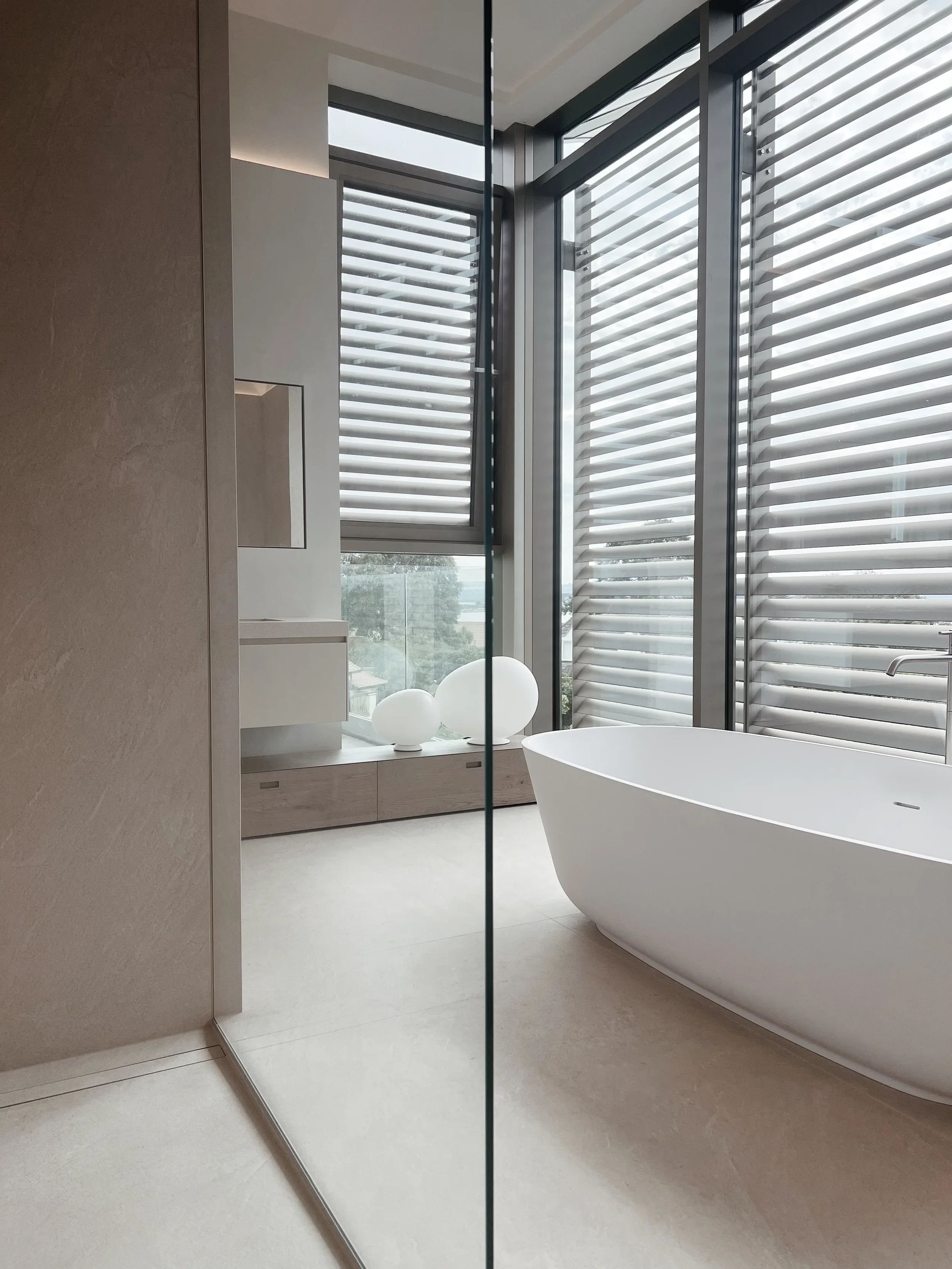 Completed PietraCasa bathroom interior highlighting custom porcelain fabrication from design to installation.