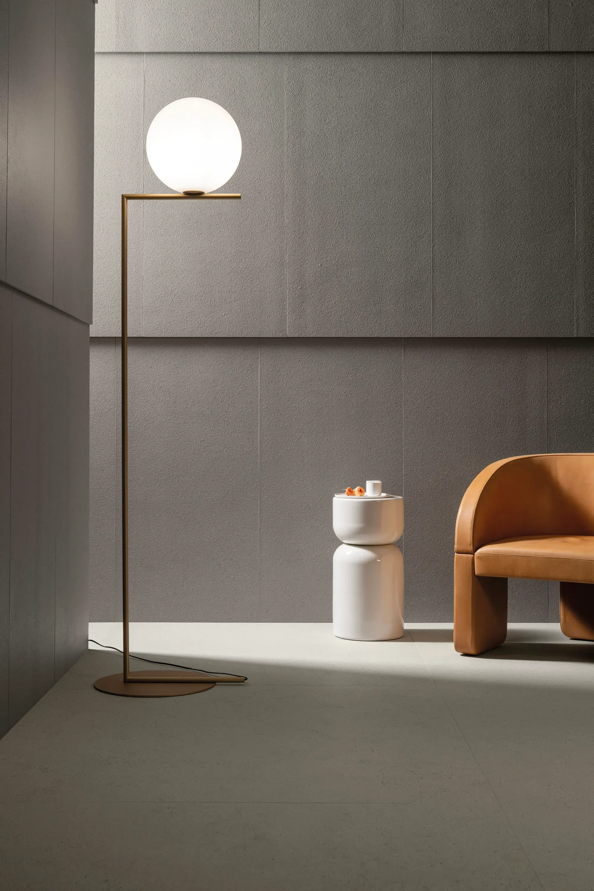 Modern interior setting featuring large-format architectural porcelain stoneware from the FMG Terrapura Collection in the Pura Argento colorway, expertly supplied and installed by PietraCasa.