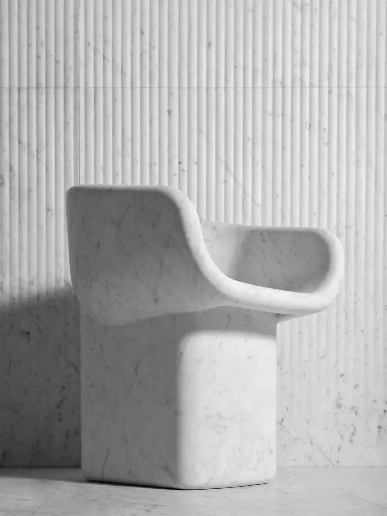 The Cosimo sculptural marble chair by Luce di Carrara, available for specification through PietraCasa.