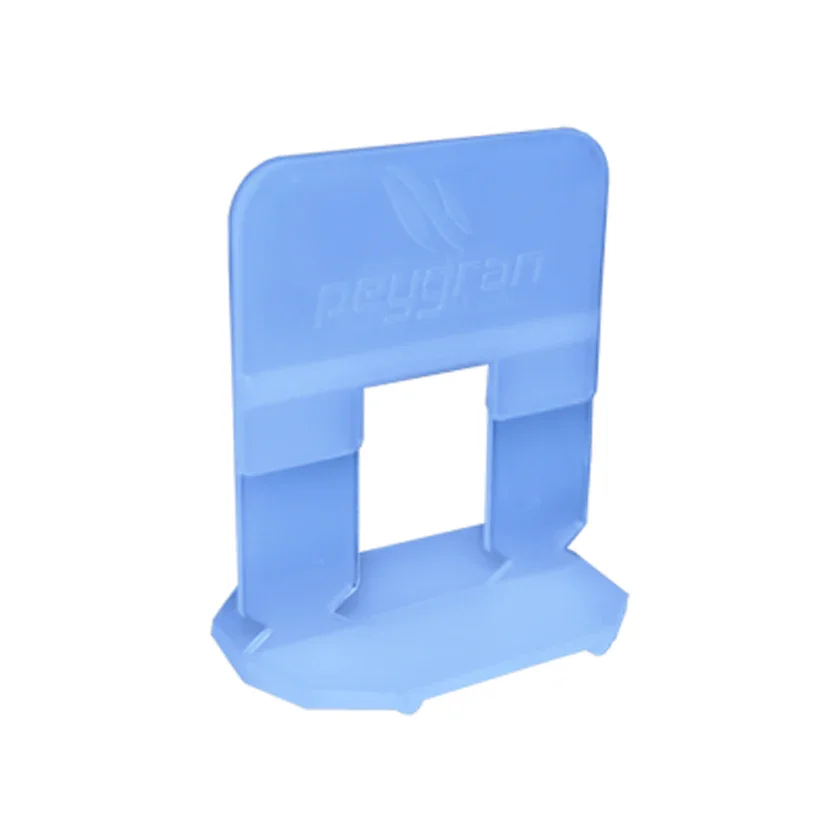 0.5mm tile spacer clip from the Peygran Tile Leveling System, engineered for precision alignment in professional, high-end installations supplied by PietraCasa.