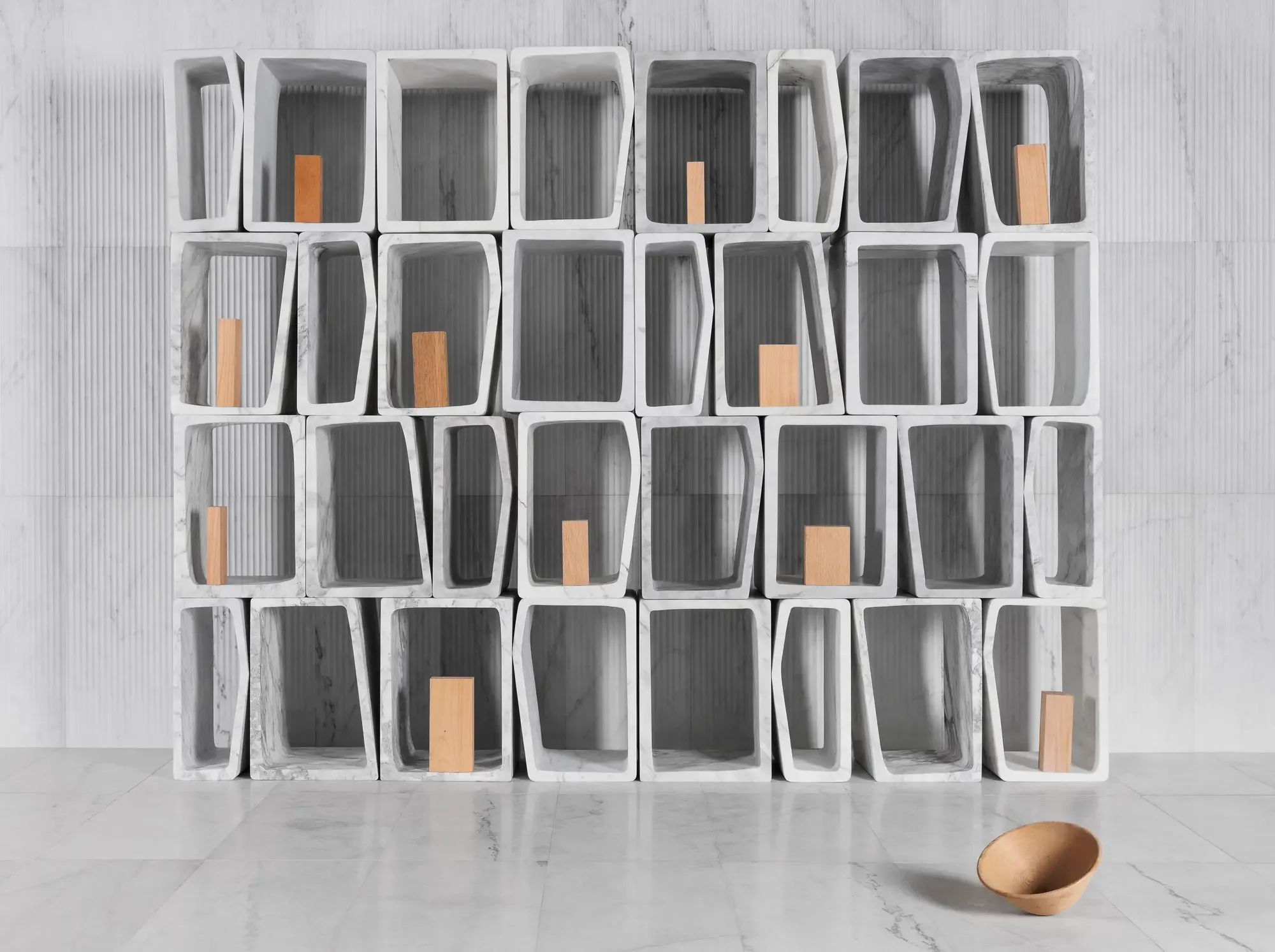 The Marmeria modular bookcase, a self-supporting, open-shelving system designed by Archea Associati for Luce di Carrara, available through PietraCasa.