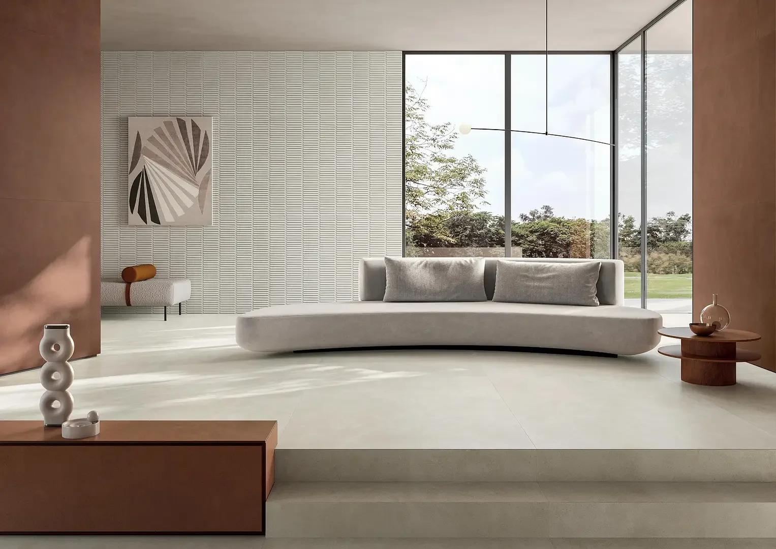 Contemporary minimalist living space featuring Italgraniti Terre Bianco porcelain stoneware tiles, known for their natural, earthy texture and durability, available through PietraCasa.