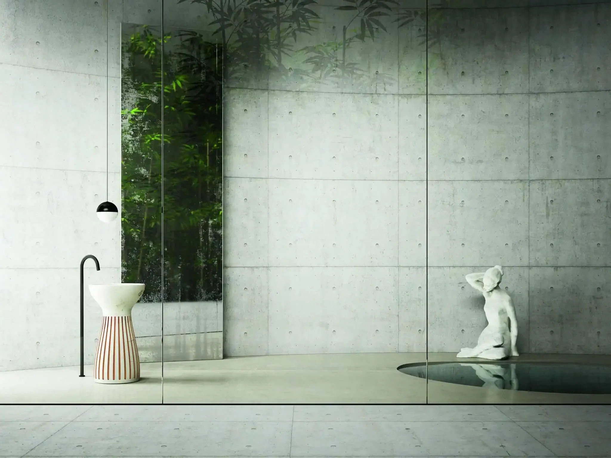 The Roma freestanding washbasin by Kreoo, designed by Marco Piva, crafted from premium marble with a distinctive fluted base that can be accented with gold leaf, available through PietraCasa.