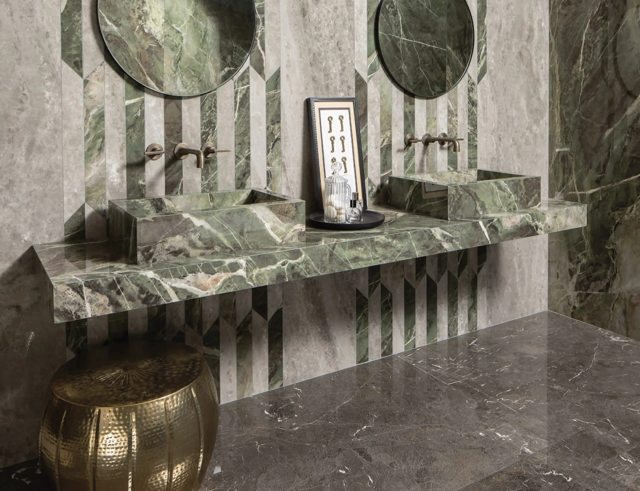 Luxurious bathroom vanity setup featuring marble-look porcelain stoneware from the Florim Heritage Luxe collection, showcasing the striking green Heritage Emerald and sophisticated grey Heritage Brown colorways, expertly supplied and installed by Pie