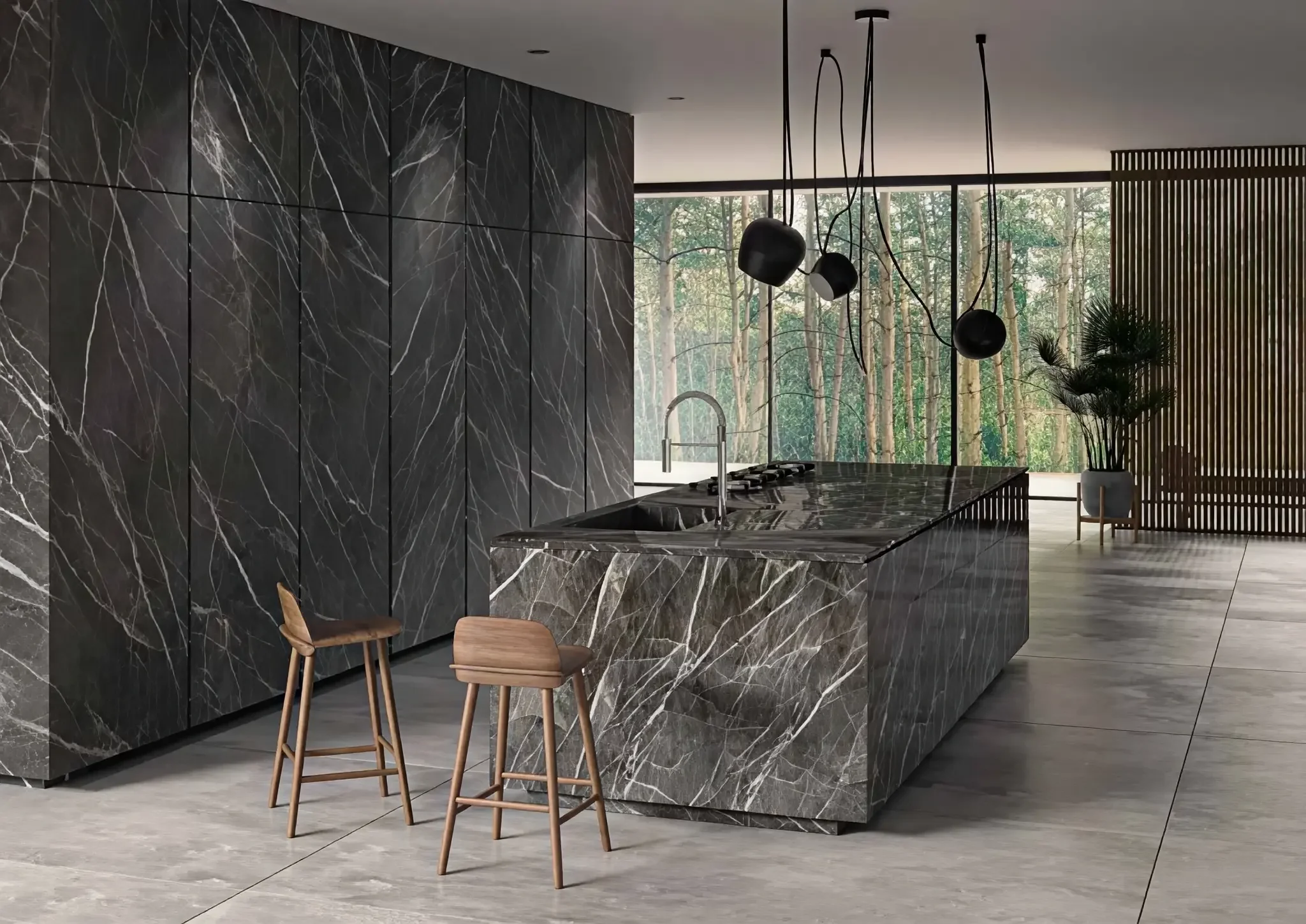 A luxury kitchen featuring surfaces clad in Laminam Diamond Calacatta Black, a premium sintered porcelain that replicates the elegant look of black marble with subtle beige and white veining, available through PietraCasa.