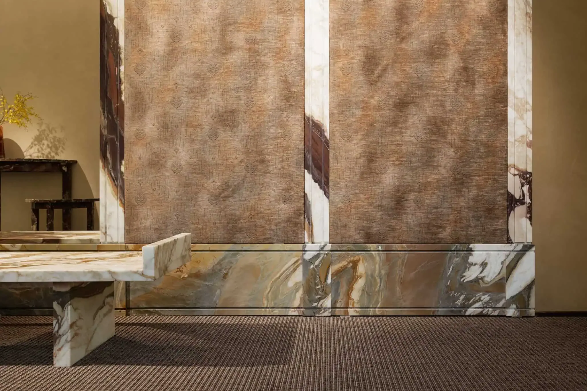 The Century boiserie wall system, designed by Christophe Pillet for the Italian brand Kreoo, featuring a sophisticated blend of textured surfaces and premium marble, available through PietraCasa.