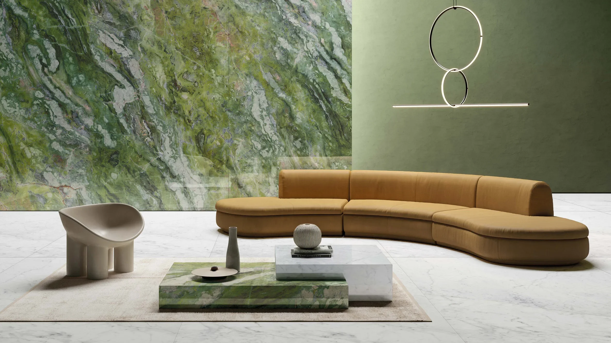 Bespoke-fabricated porcelain coffee table and feature wall using Ariostea Ultra Marmi Brilliant Green texture, supplied and installed nationwide by PietraCasa.