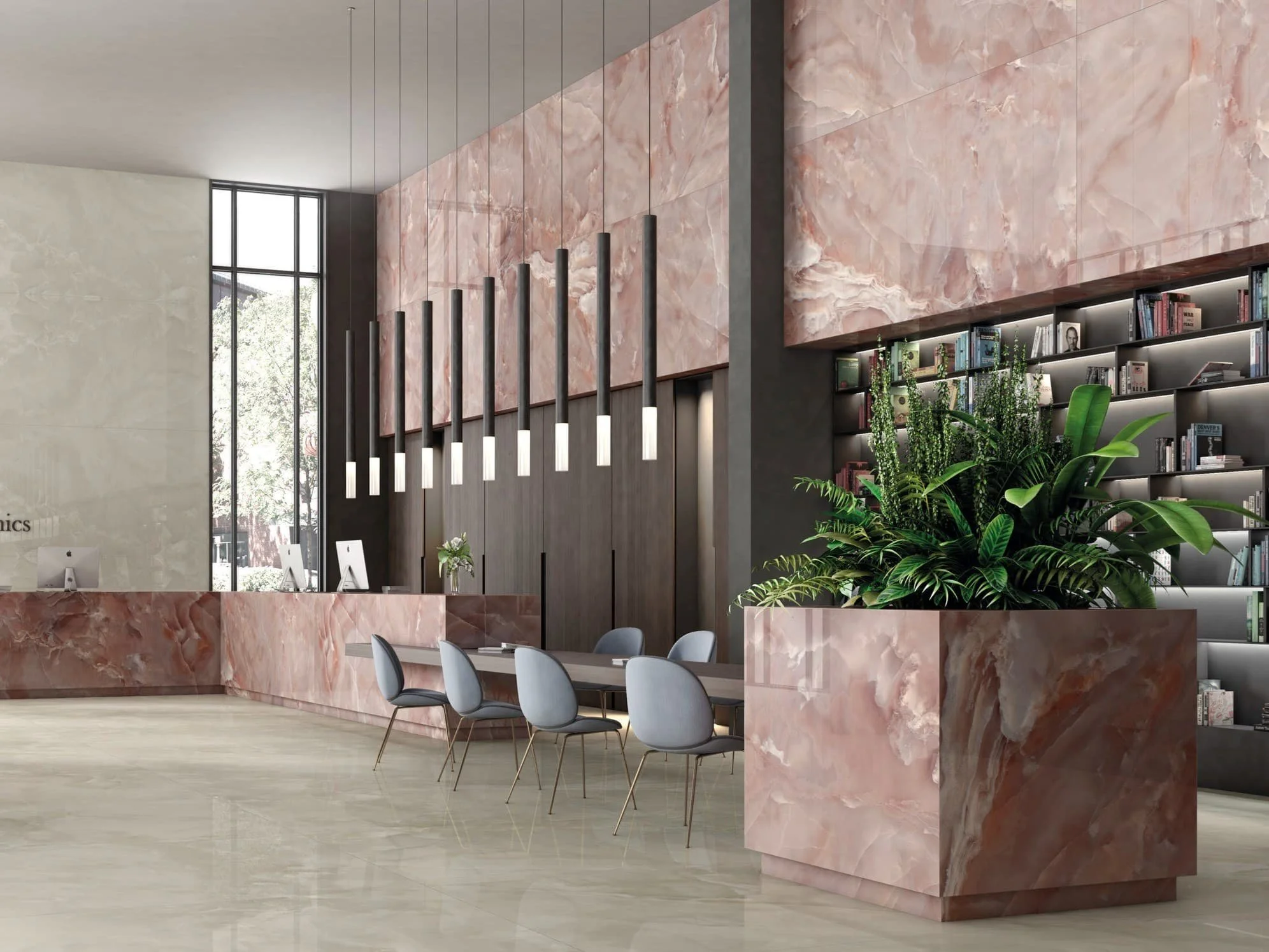 Luxurious lobby interior featuring Onice Malaga polished porcelain slabs by FMG Fabbrica Marmi e Graniti, showcasing luminous pink and cream onyx tones on walls and custom-clad planters, expertly supplied and installed by PietraCasa.