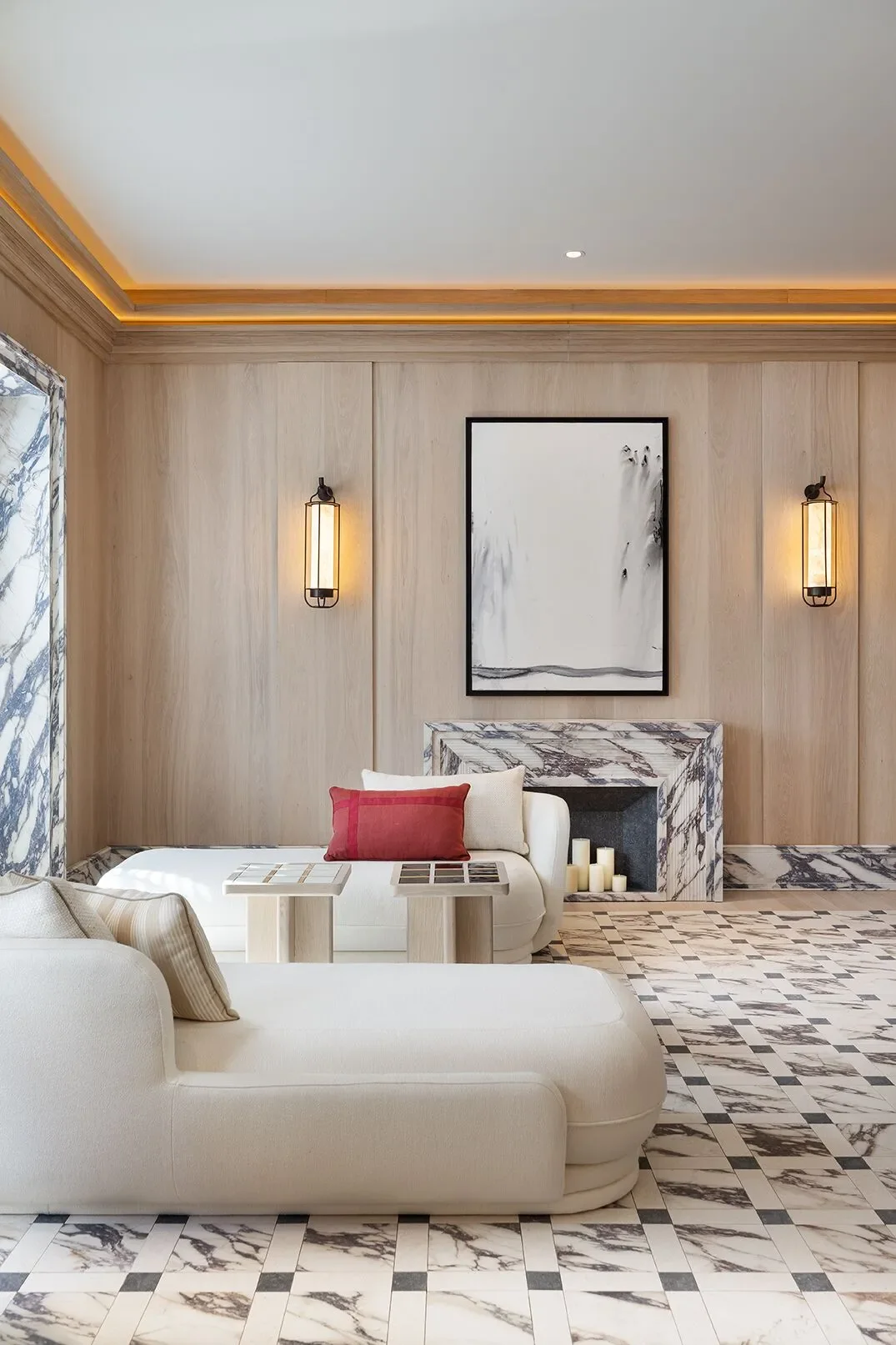 Luxurious seating area featuring the 'Dress Code' collection by Jaime Beriestain and SapienStone, with fireplace surround and flooring in Fior di Viola and Ombra di Luce 4D porcelain slabs, supplied by PietraCasa.