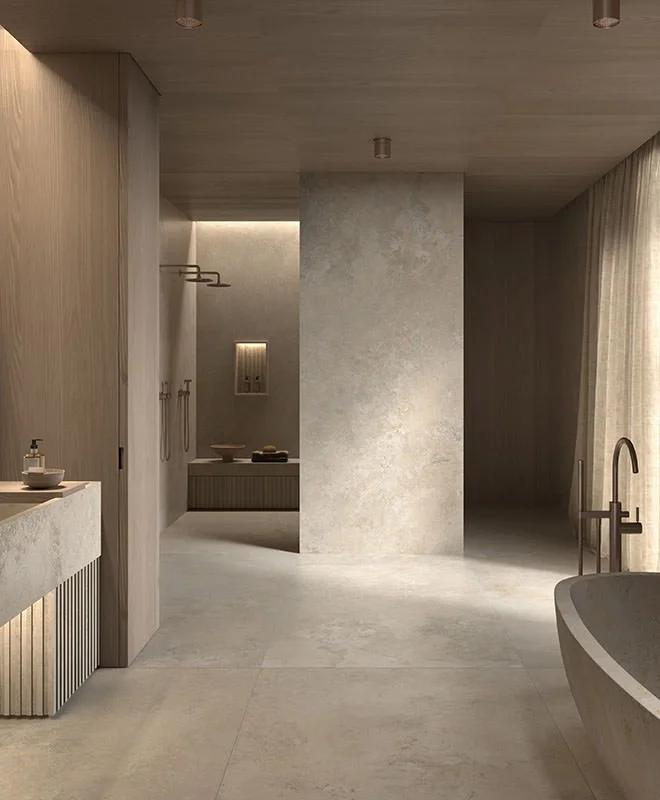 A Japandi-style bathroom curated by Kronos Ceramiche, highlighting a total look in premium porcelain stoneware, available through PietraCasa.