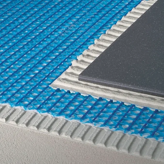 Close-up installation view of Cercol Blanke PERMAT underlayment sheet, an uncoupling and reinforcing membrane for tile and natural stone, supplied by PietraCasa.
