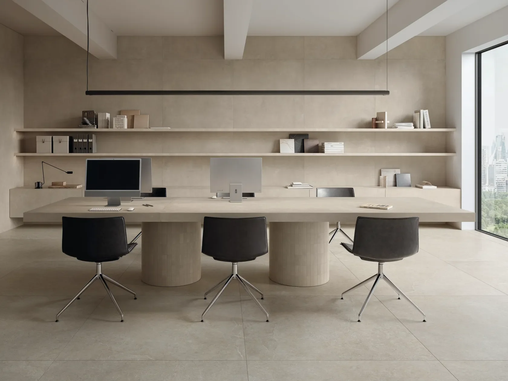Ultra-minimalist professional workspace featuring coordinated Limestone collection porcelain stoneware by Impronta, Italgraniti Group, applied to flooring, wall cladding, and custom desktop surfaces, supplied by PietraCasa.