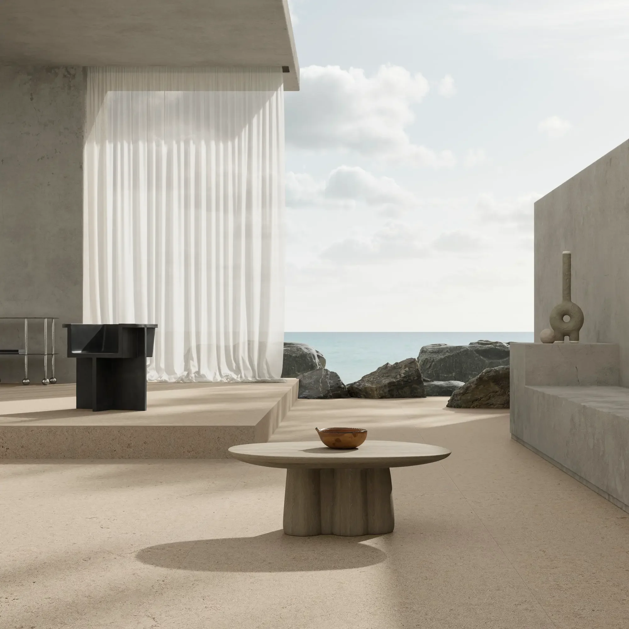 Serene coastal interior featuring Ariostea Elementae porcelain stoneware flooring, designed to emulate the look of natural Portuguese limestone, supplied and installed nationwide by PietraCasa.