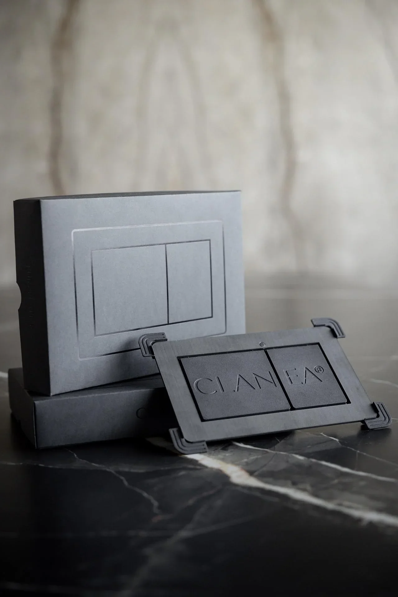 Clanea PurePlate R, a Swiss-made, invisible toilet flush plate designed for minimalist bathroom aesthetics, supplied and installed by PietraCasa.