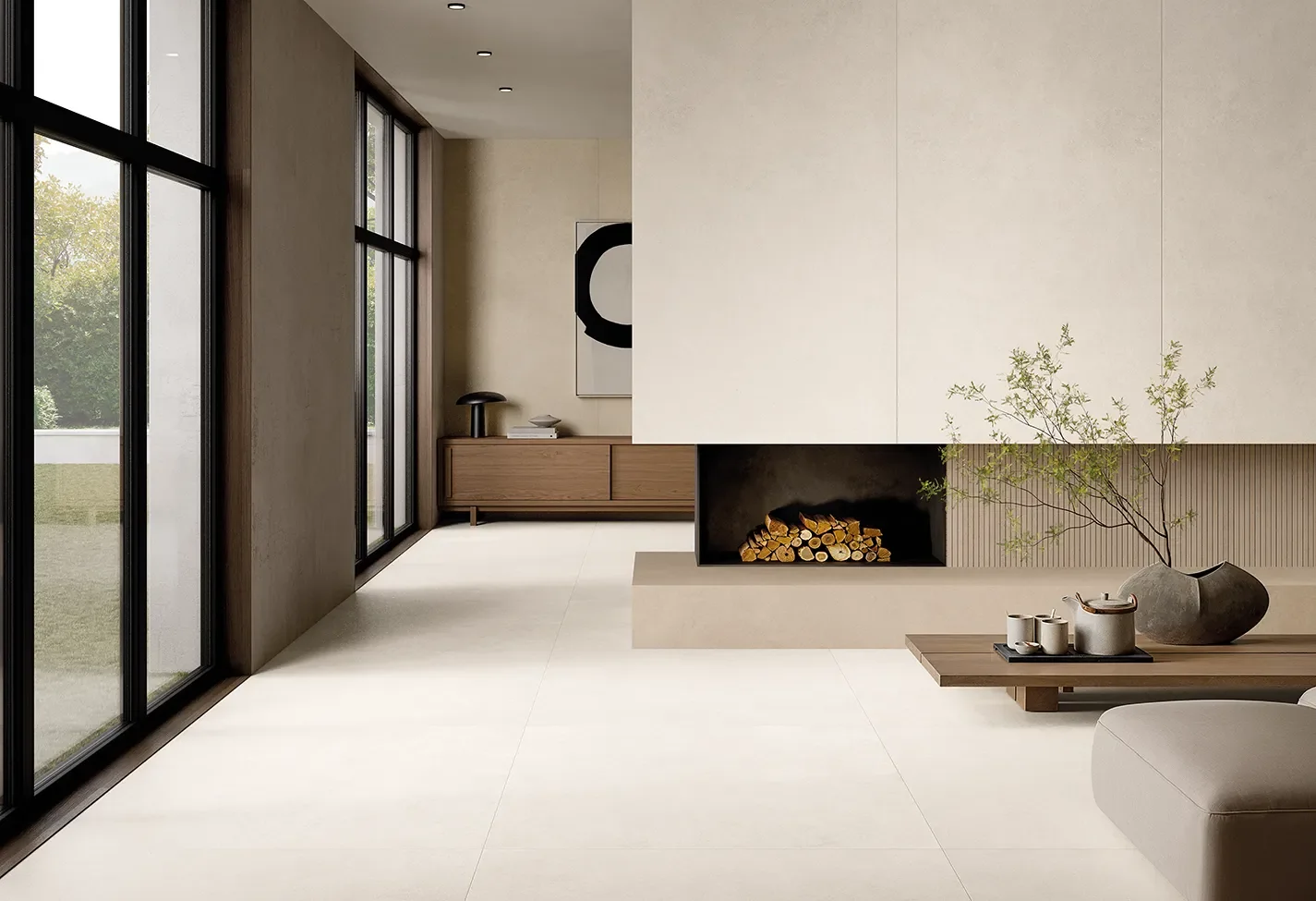 Tranquil, modern living space featuring Ceramiche Keope Grace limestone-effect porcelain stoneware tiles, available through PietraCasa.