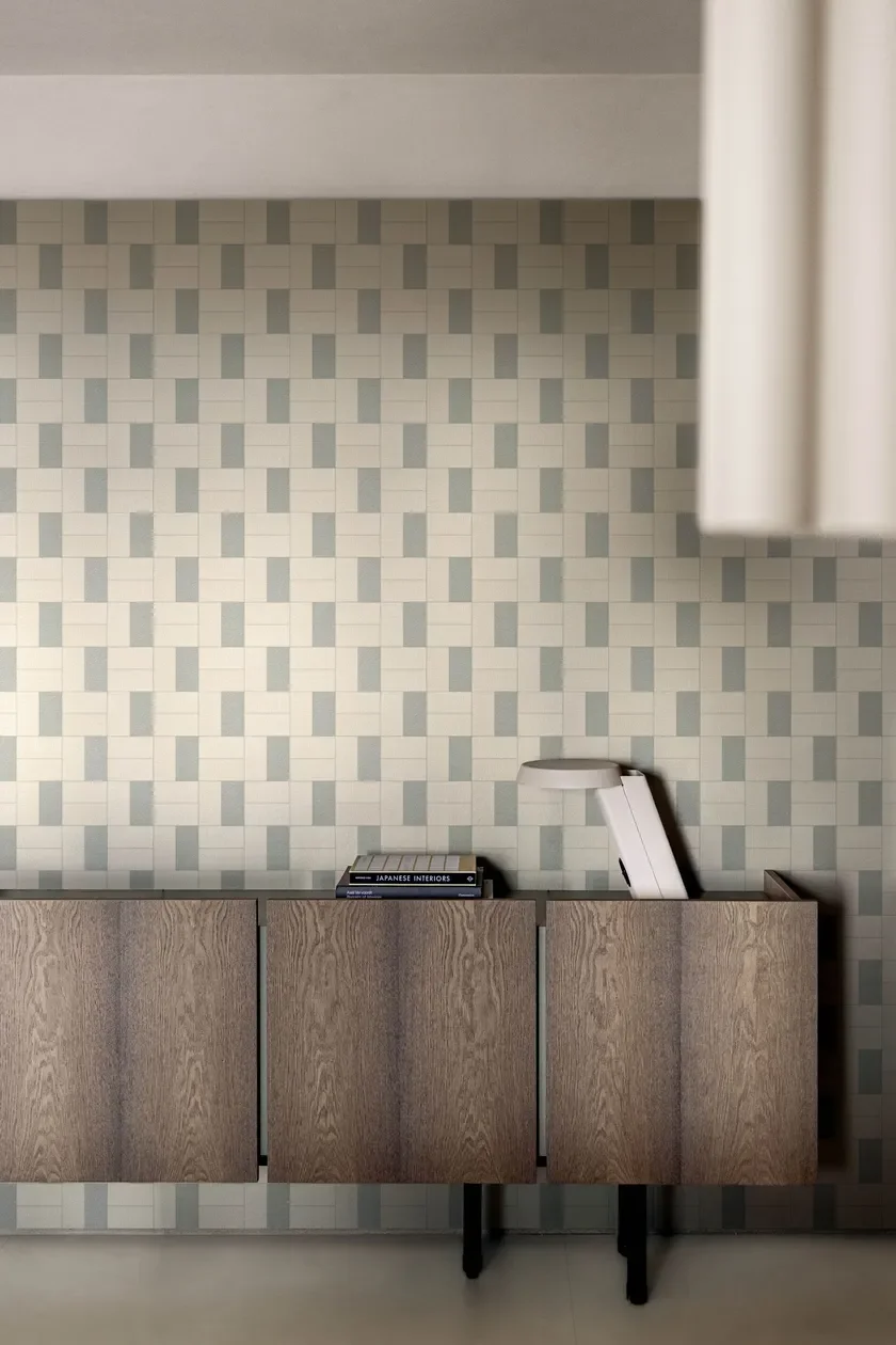 Contemporary interior featuring the Segnature collection by CEDIT, designed by Cristina Celestino, featuring a geometric pattern inspired by plant textures and crepe paper, supplied and installed nationwide by PietraCasa.