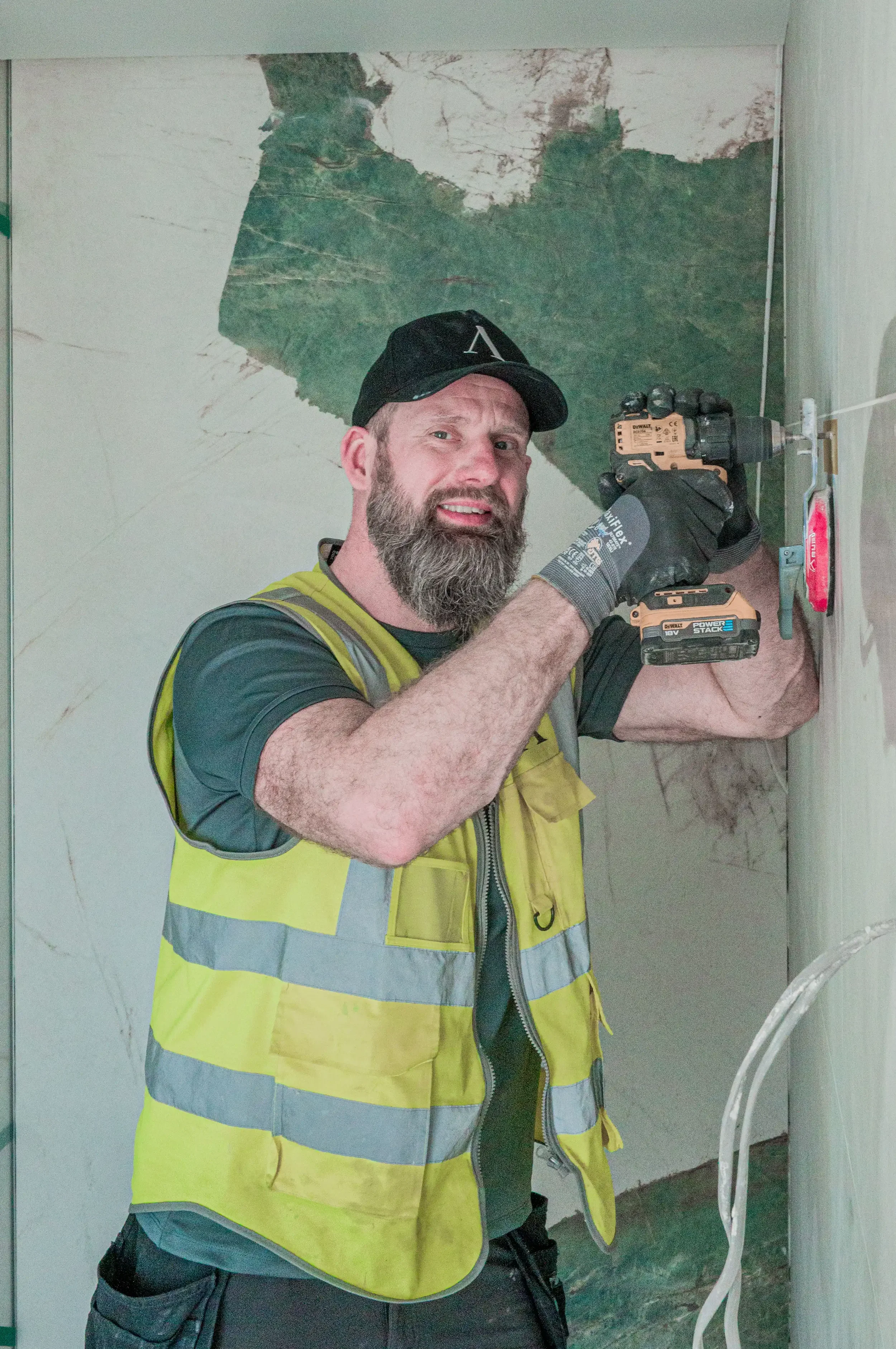 Senior Installer Pawel Szewczyk at PietraCasa, specializing in bespoke porcelain fabrication and precision installation.