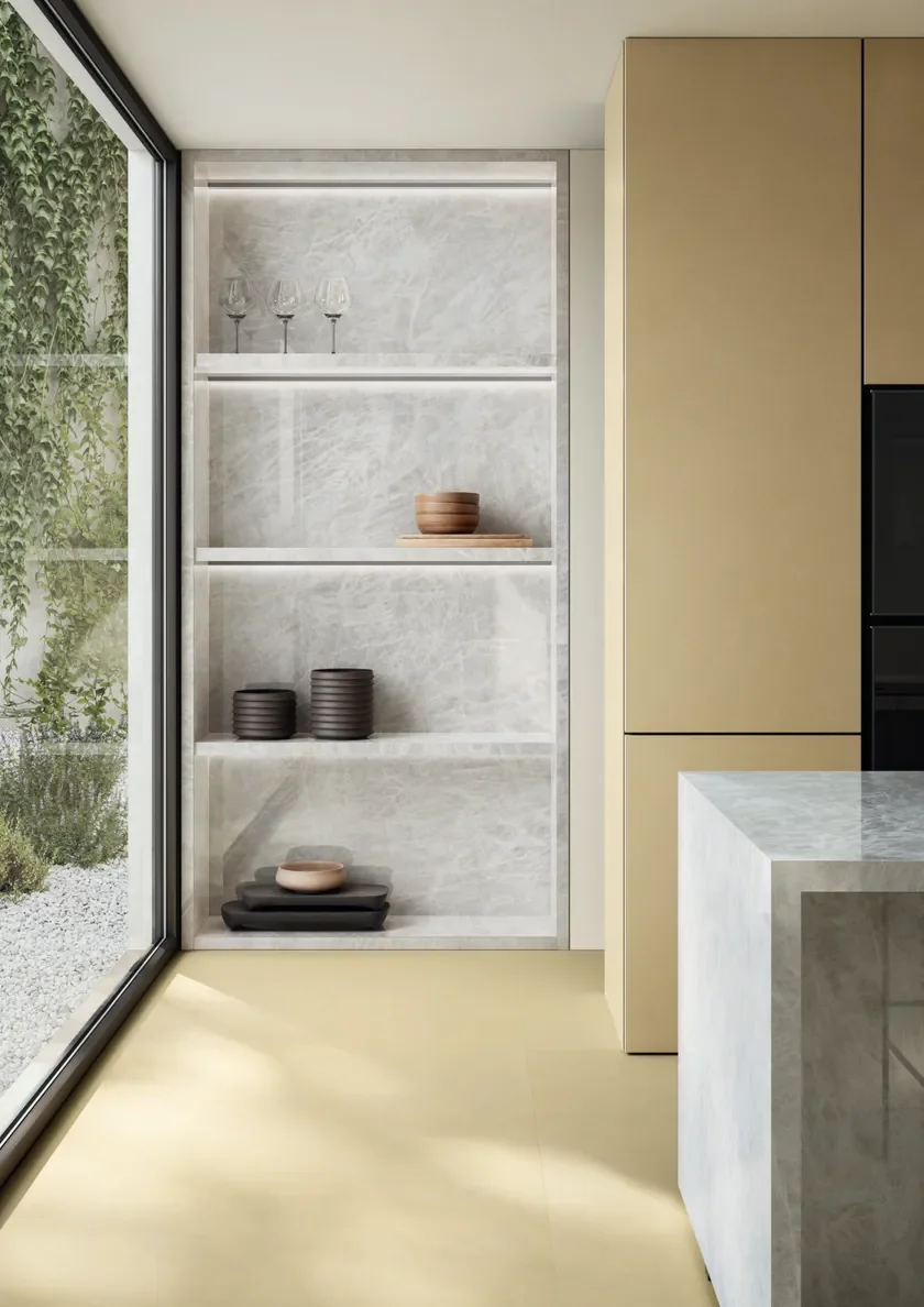 Integrated built-in storage niche and kitchen island featuring CRISTALLO Antibacterial Porcelain Stoneware Slabs by ITALSTONE, available through PietraCasa."  Meta Description: "Achieve a continuous, luxurious aesthetic with ITALSTONE’s CRISTALLO Ant