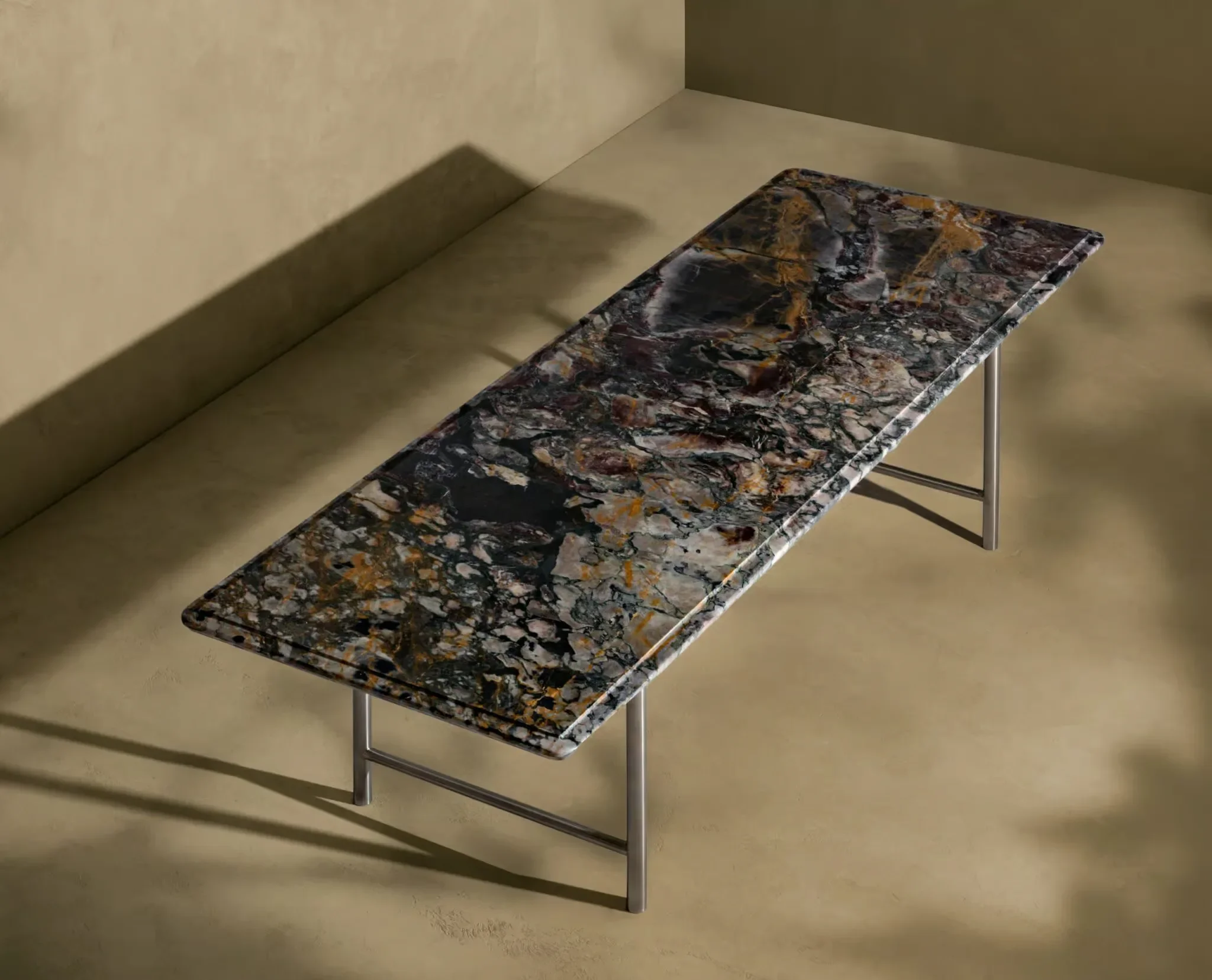 The Prince Rectangular Table by Kreoo, designed by Christophe Pillet, featuring a striking top in Breccia di Vendome marble set on a minimalist, tubular metal base, available through PietraCasa.