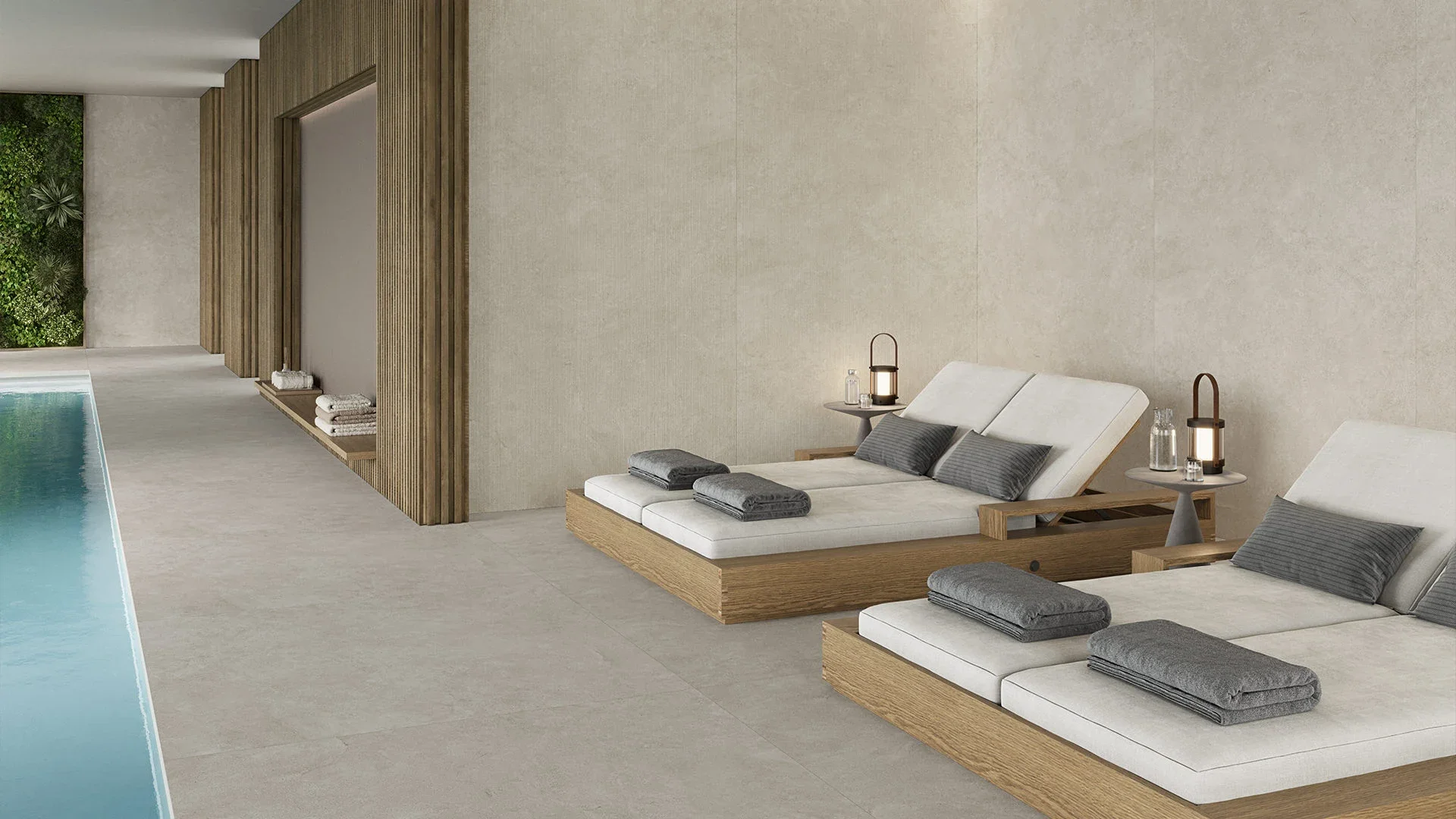 Serene poolside area featuring the Inalco Nora MDi collection, a premium white-stone effect porcelain tile, exclusively distributed in the UK by PietraCasa.