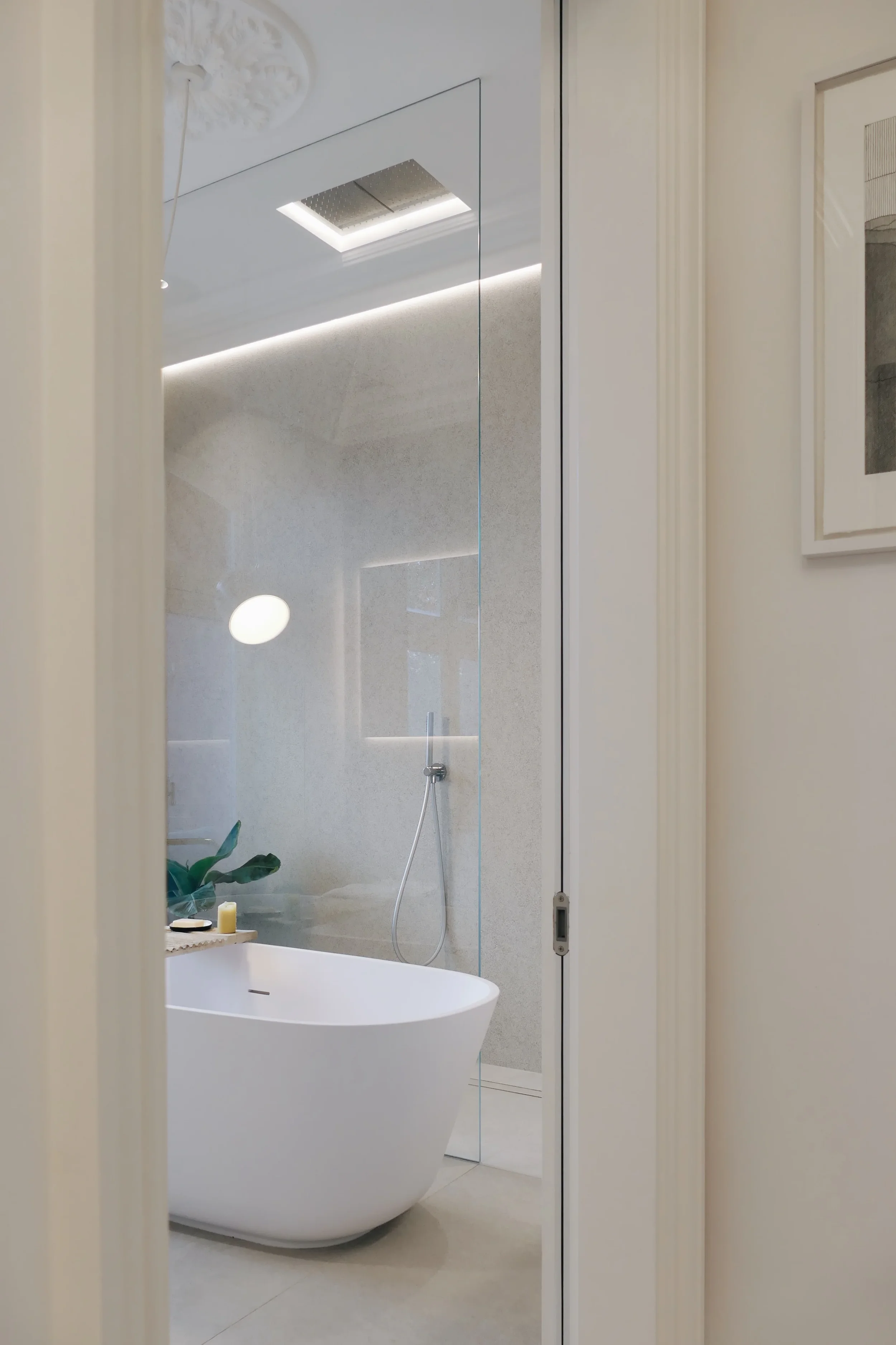 Modern freestanding bathtub and walk-in glass shower with Living Ceramics porcelain wall tiles, designed by Pietracasa and Abitalia