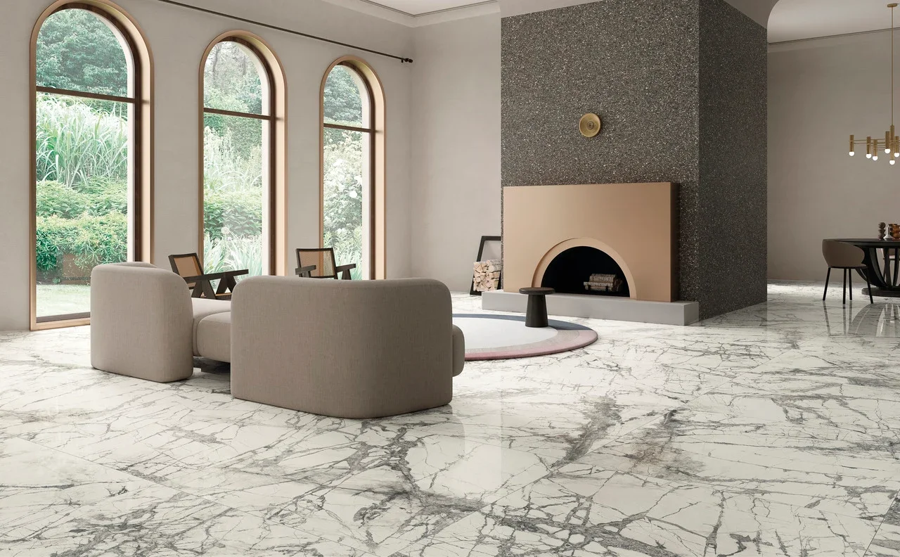 Elegant luxury living room featuring polished Ariostea Imperial Grey marble-effect porcelain tiles, supplied and installed nationwide by PietraCasa.