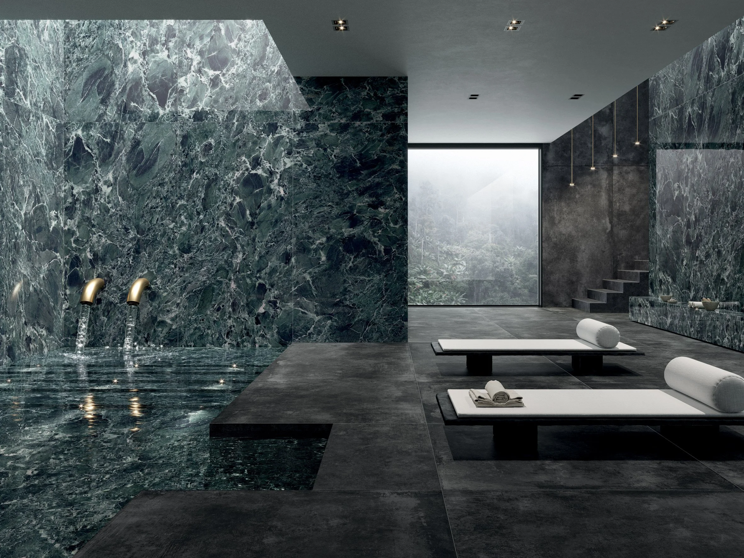 Luxury spa interior featuring dramatic green marble-effect porcelain wall cladding and dark industrial-style floor tiles, supplied and installed nationwide by PietraCasa.
