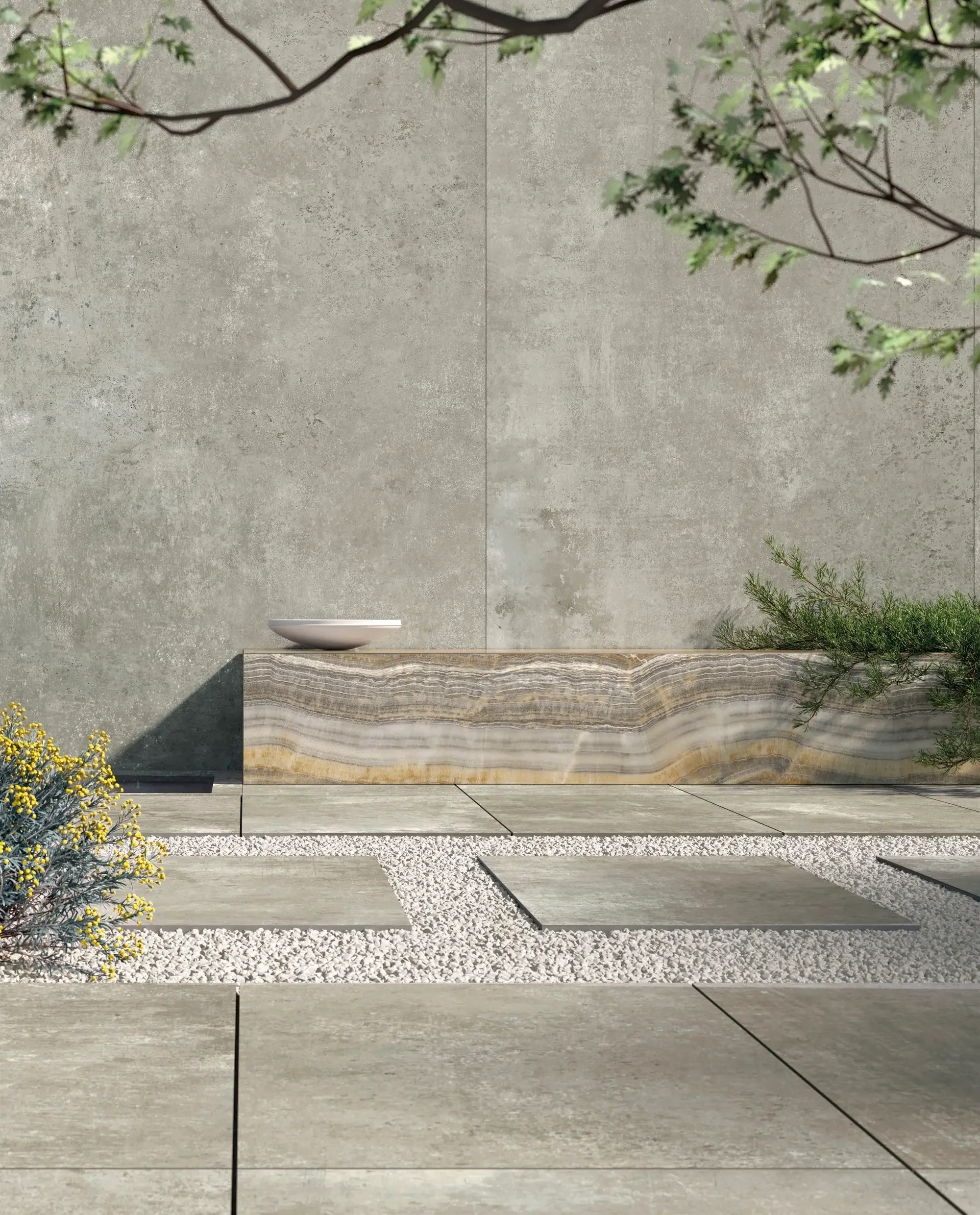 Modern outdoor patio featuring Ariostea Con.Crea porcelain stoneware with a natural concrete effect, supplied and installed nationwide by PietraCasa.