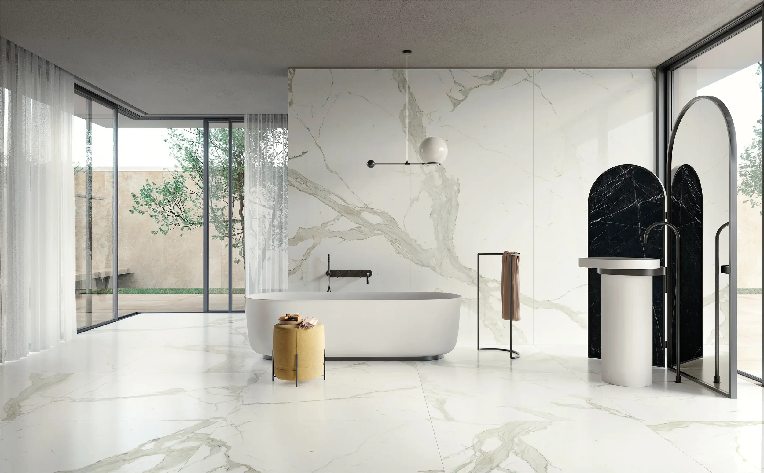 Luxury bathroom featuring polished Ariostea Bianco Calacatta marble-effect porcelain stoneware from the Ultra Marmi collection, supplied and installed nationwide by PietraCasa.
