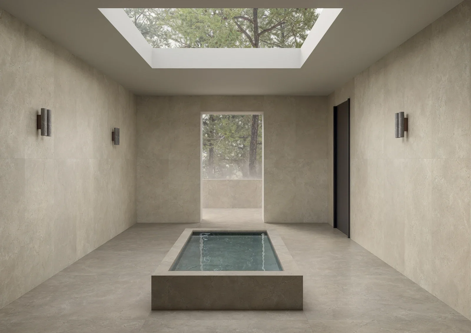Tranquil spa interior clad in the Calcis collection by Italgraniti Group, a porcelain stoneware line featuring a hybrid of limestone and Marfil marble, available through PietraCasa.