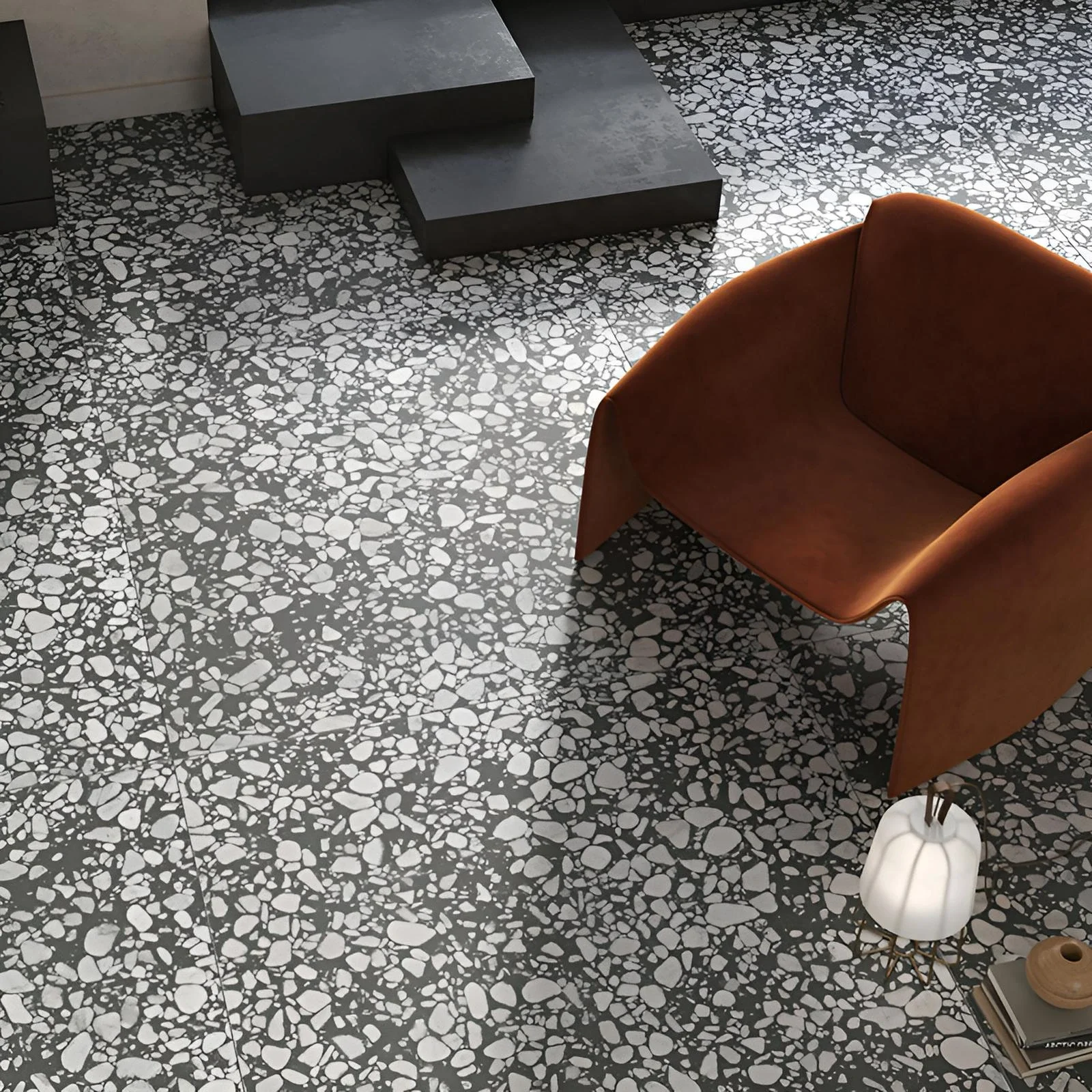 Modern interior flooring featuring the Cluster collection by Terratinta Group, showcasing a bold terrazzo-effect design, supplied by PietraCasa.