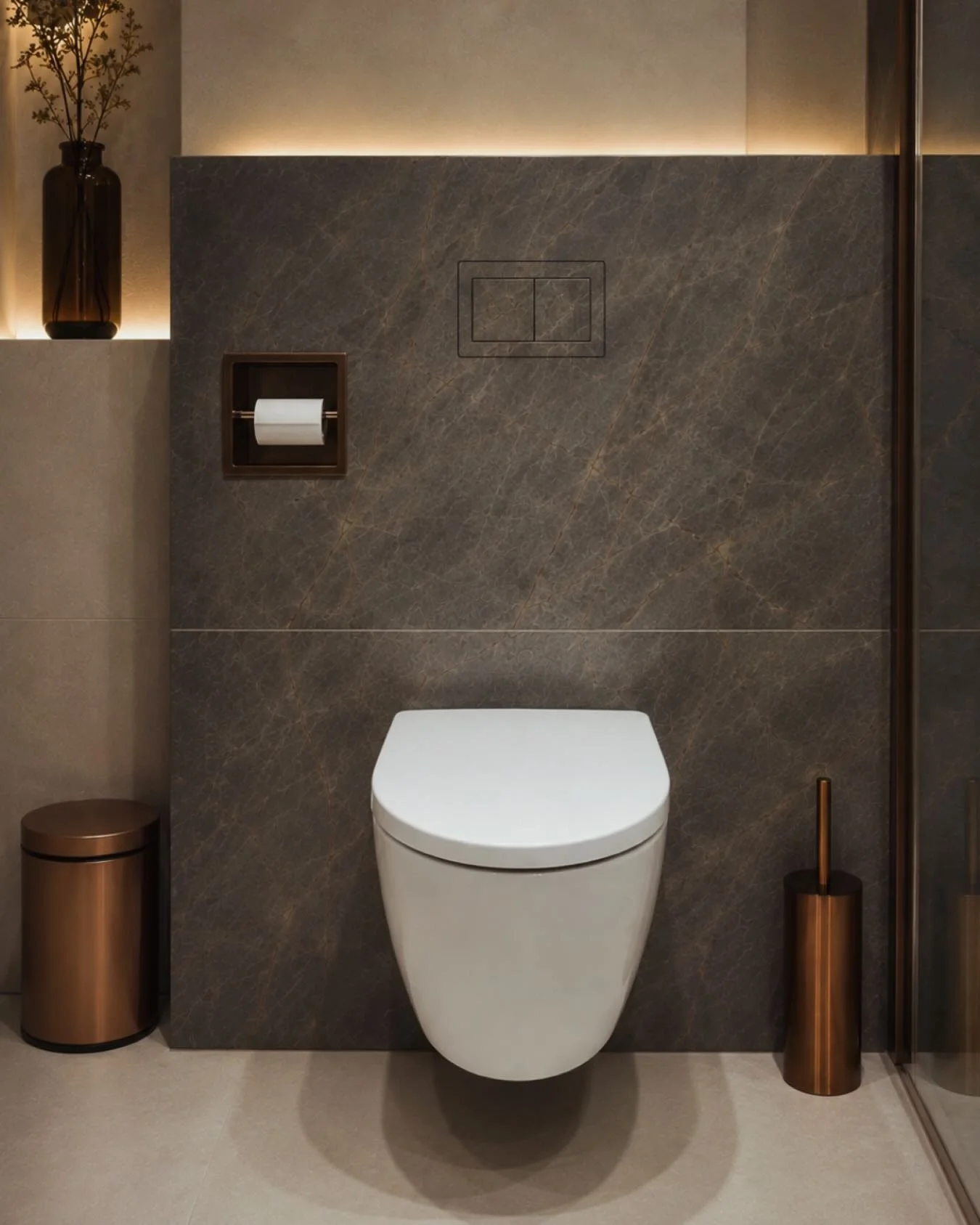 Luxury minimalist bathroom featuring the Swiss-made Clanea PurePlate flush hardware, seamlessly integrated into a dark marble-look wall, supplied and installed by PietraCasa