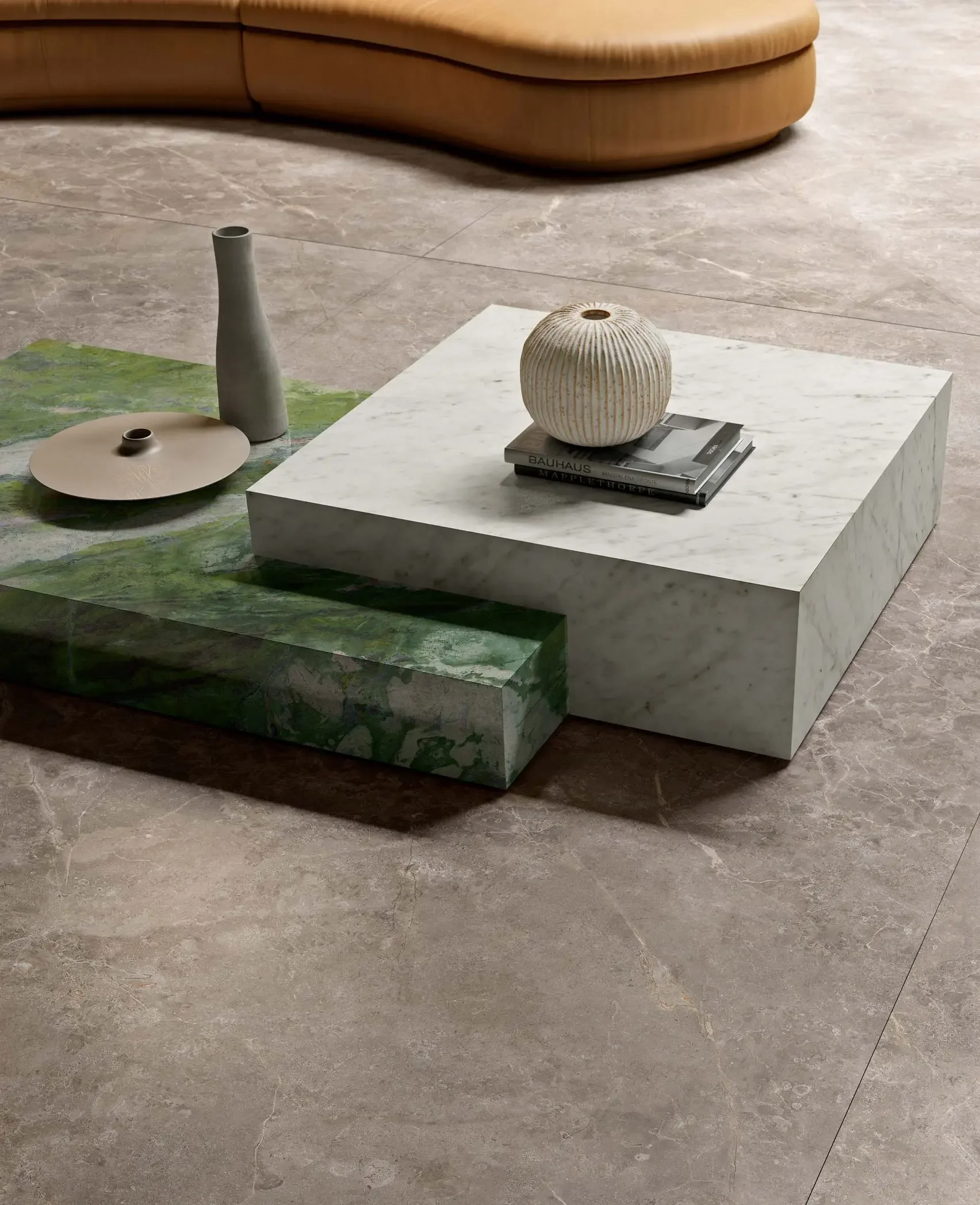 Bespoke coffee table featuring an interlocking design with green and white marble-look Ariostea Ultra Marmi porcelain stoneware slabs, supplied and installed nationwide by PietraCasa.