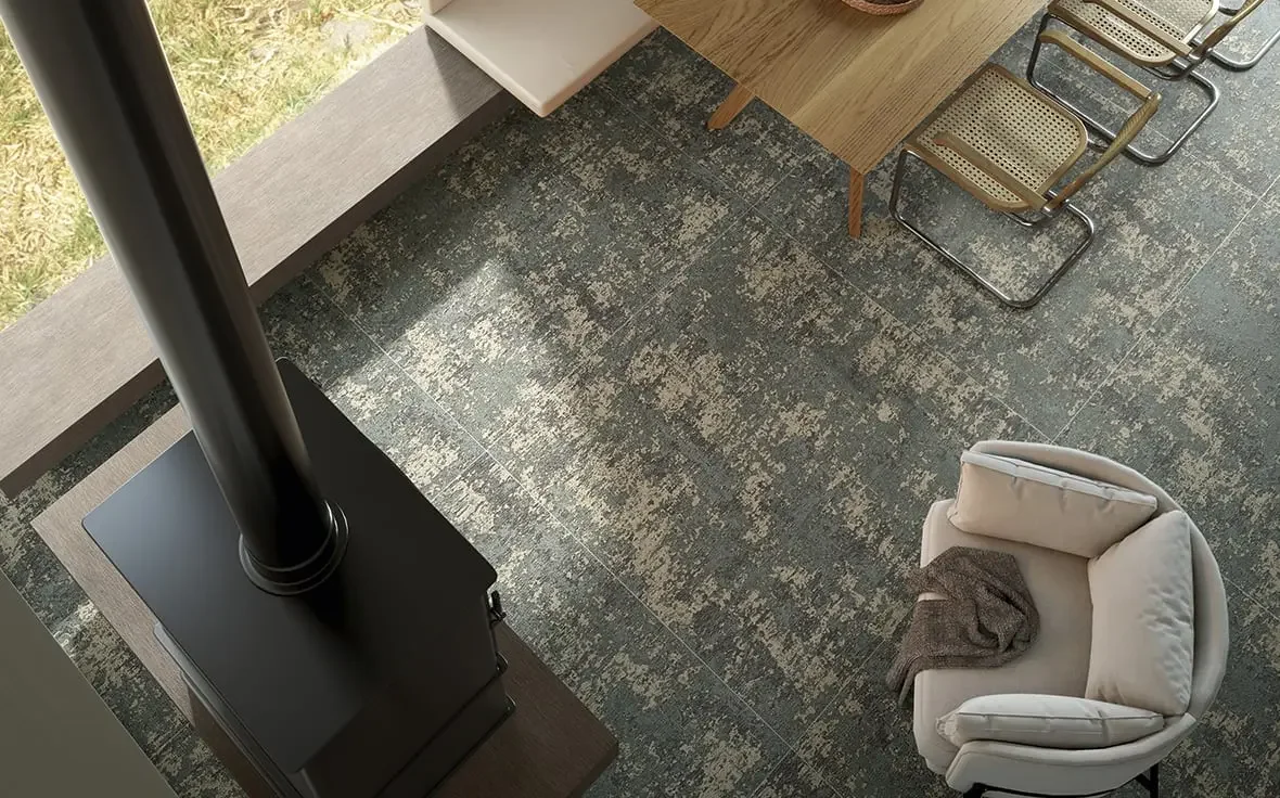 Modern interior space featuring 'Trame Camouflage' porcelain stoneware from the Thékē Trame Decori collection by Iris Ceramica, available through PietraCasa.