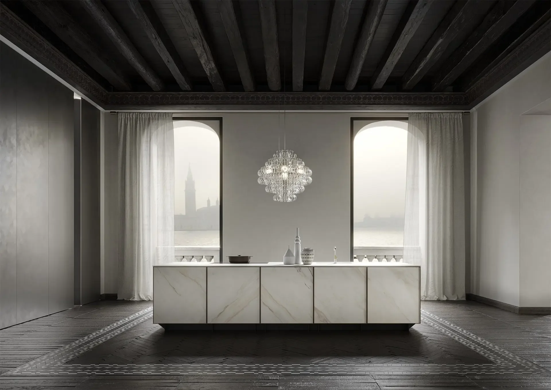 Luxury kitchen island wrapped in precious Bianco Lasa marble, specifically the Lasa Covelano Vena Oro by Antolini, and framed by solid walnut, supplied by PietraCasa.
