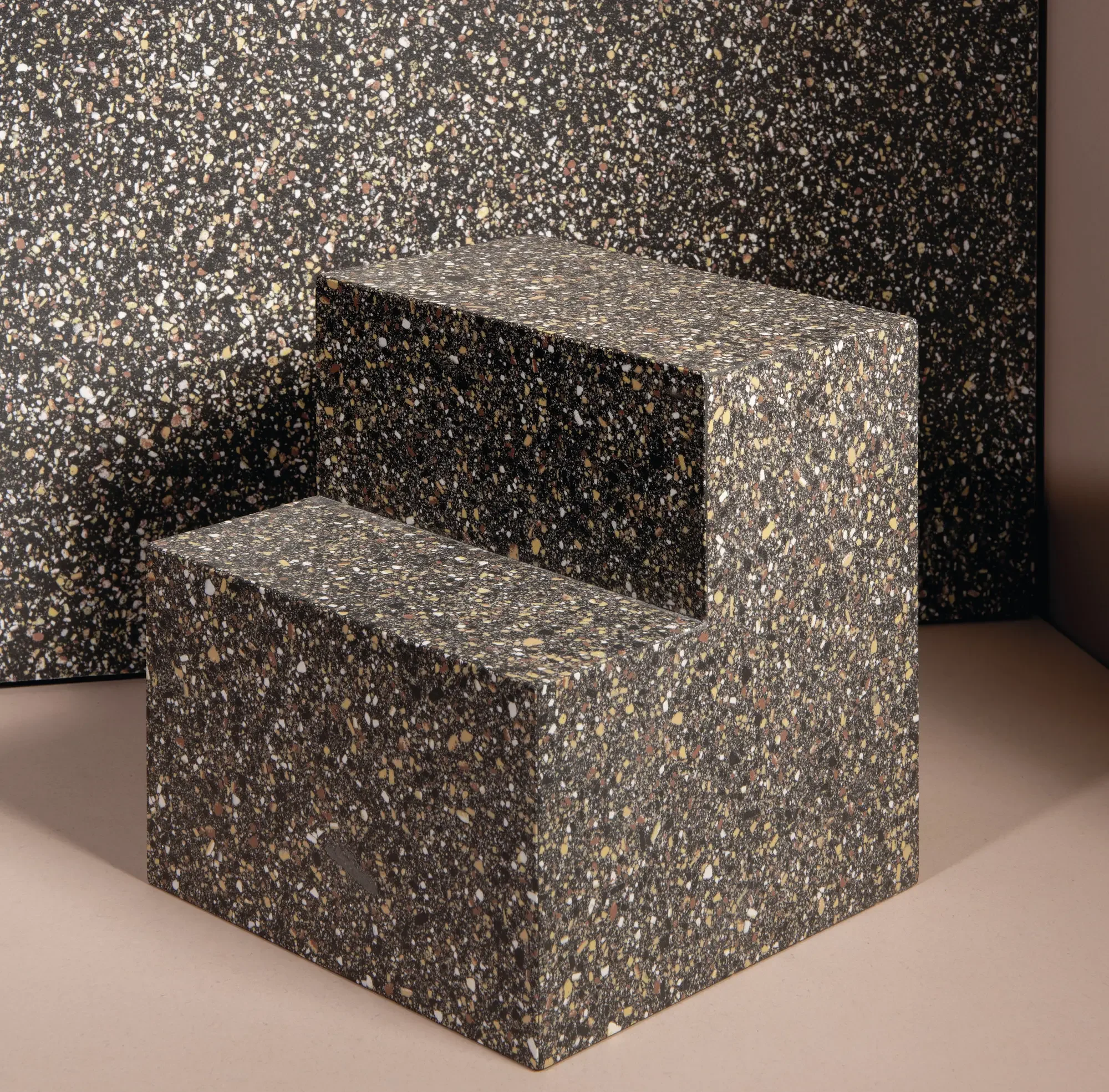 Close-up of Fiandre Seminato Bruno porcelain stoneware, featuring a distinctive and uniform sprinkle of mineral particles across the surface, expertly supplied and installed by PietraCasa.
