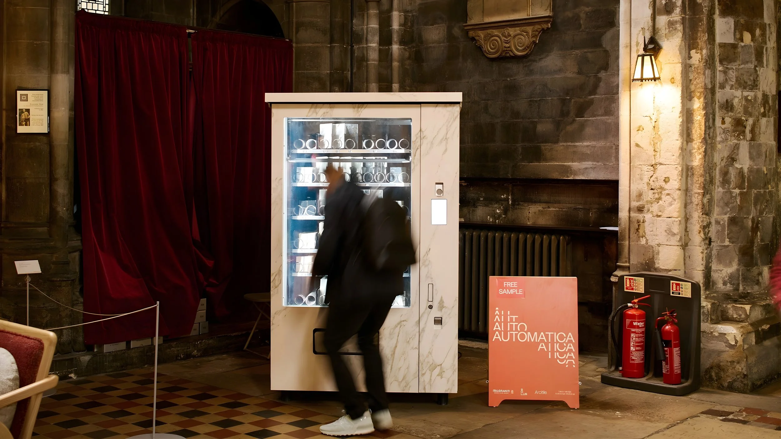 Marble-clad vending machine from the 'Automatica' installation at Clerkenwell Design Week, designed by architect Simon Astridge in collaboration with Italgraniti and Solus, showcasing creative applications for porcelain surfaces.