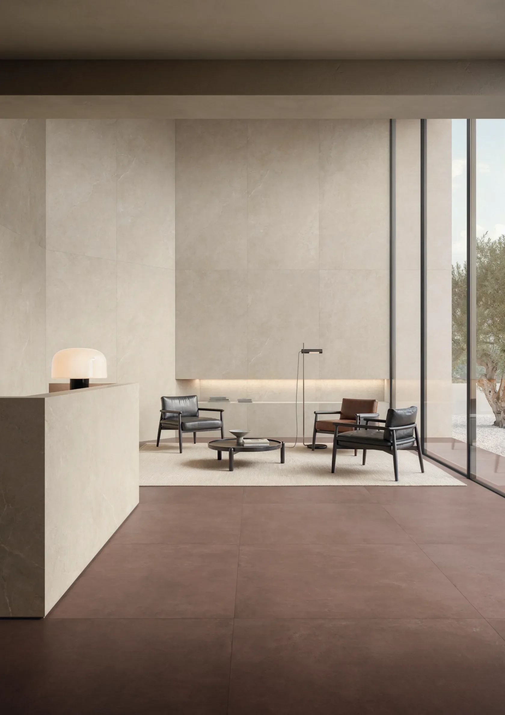 Minimalist living space featuring the Concrete collection by Impronta Ceramiche, demonstrating the sleek, contemporary aesthetic achievable with high-end porcelain stoneware, supplied by PietraCasa.