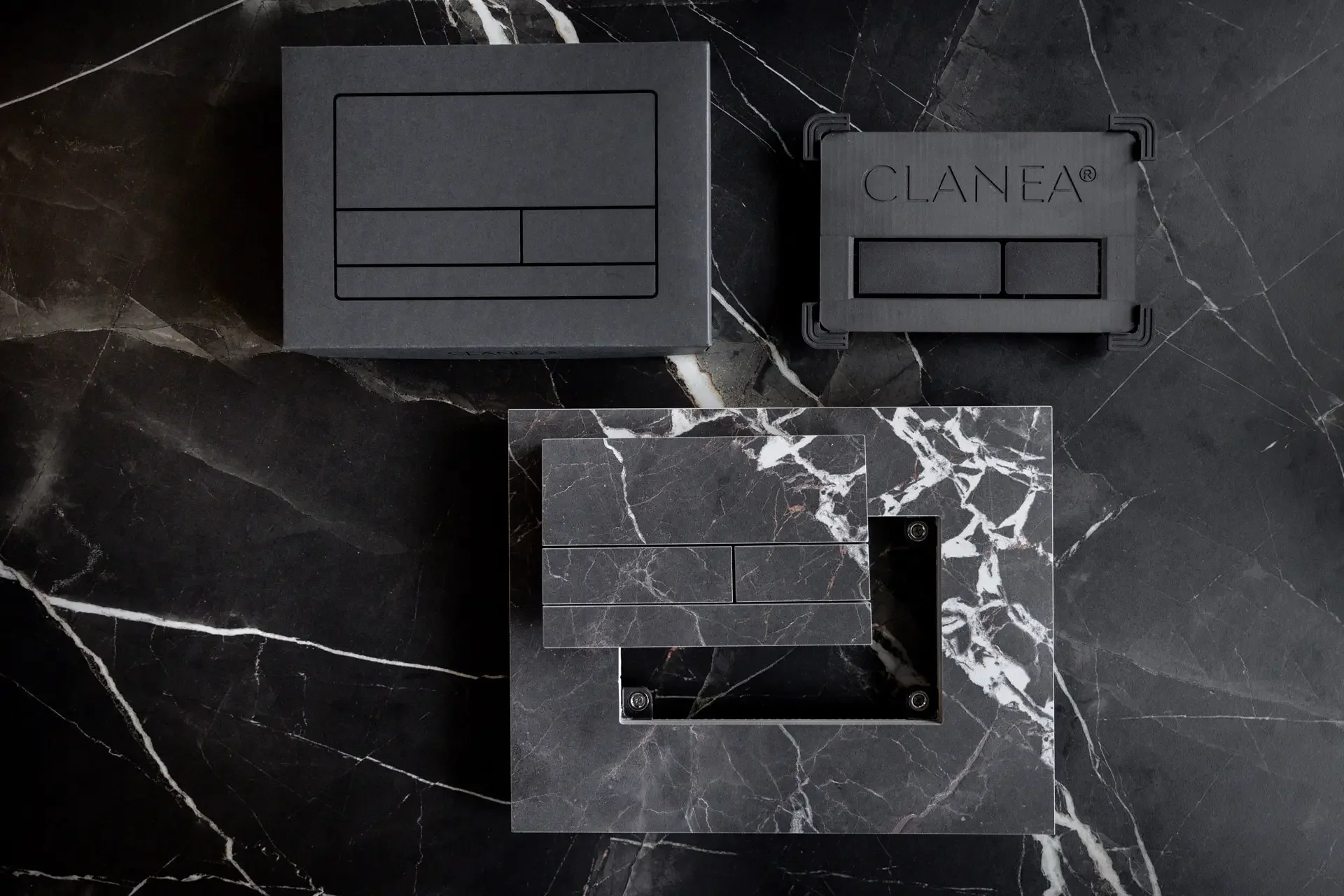 The Clanea PurePlate, an innovative flush-mounted toilet flush cover system made in Switzerland, engineered to sit flush with wall tiles for a seamless finish, supplied by PietraCasa.