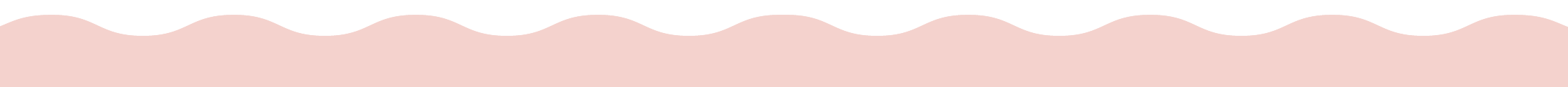Close-up of a row of pink cupcakes with black frosting topping.