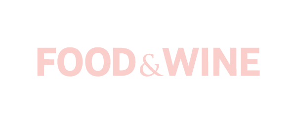 Text reading 'FOOD & WINE' on a black background with pink and white lettering.