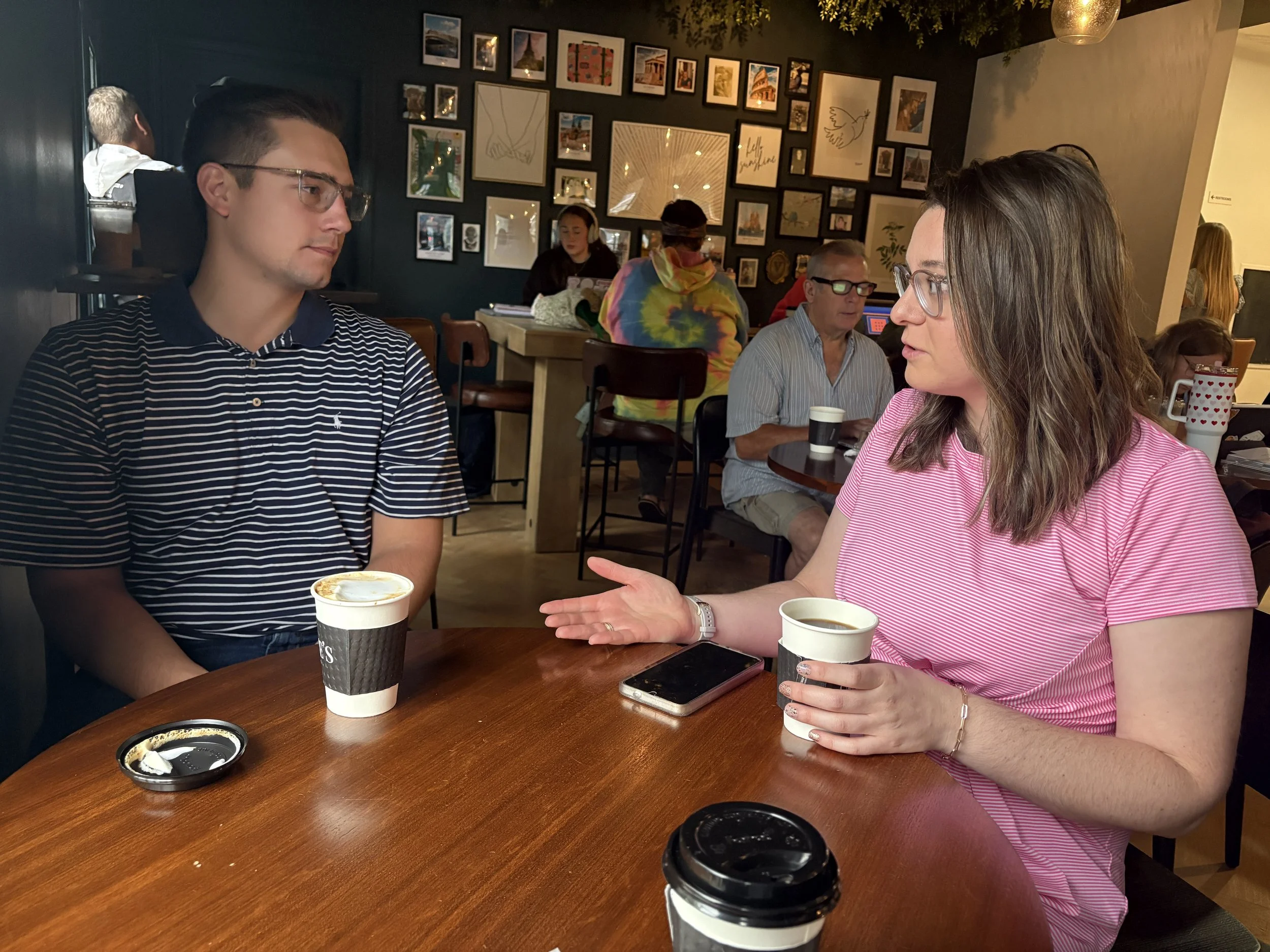 woman and man meeting at coffee shop