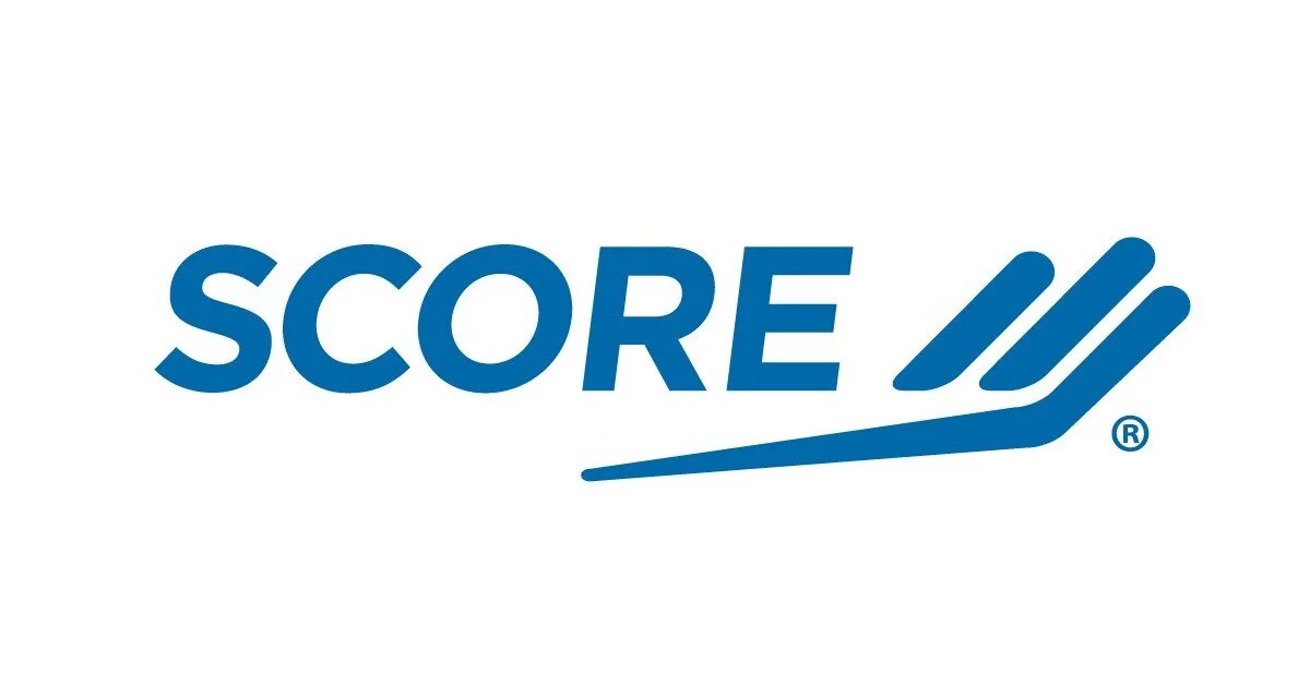 SCORE logo with stylized blue text and graphics on a white background.